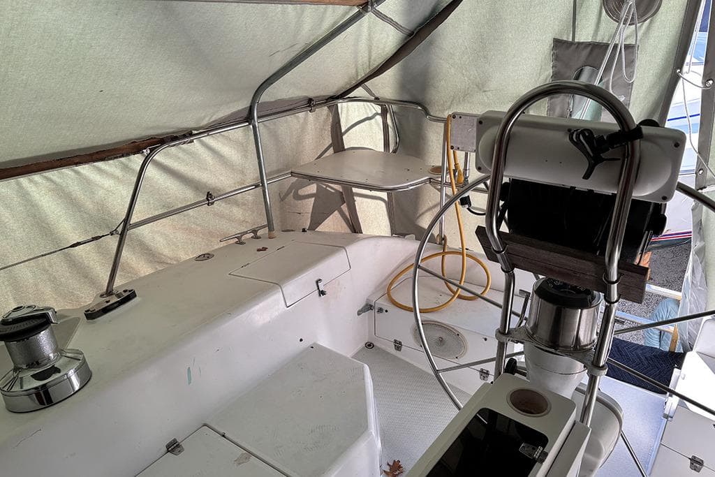 Interior view of a 1999 Catalina 42 MkII sailboat cockpit under cover.