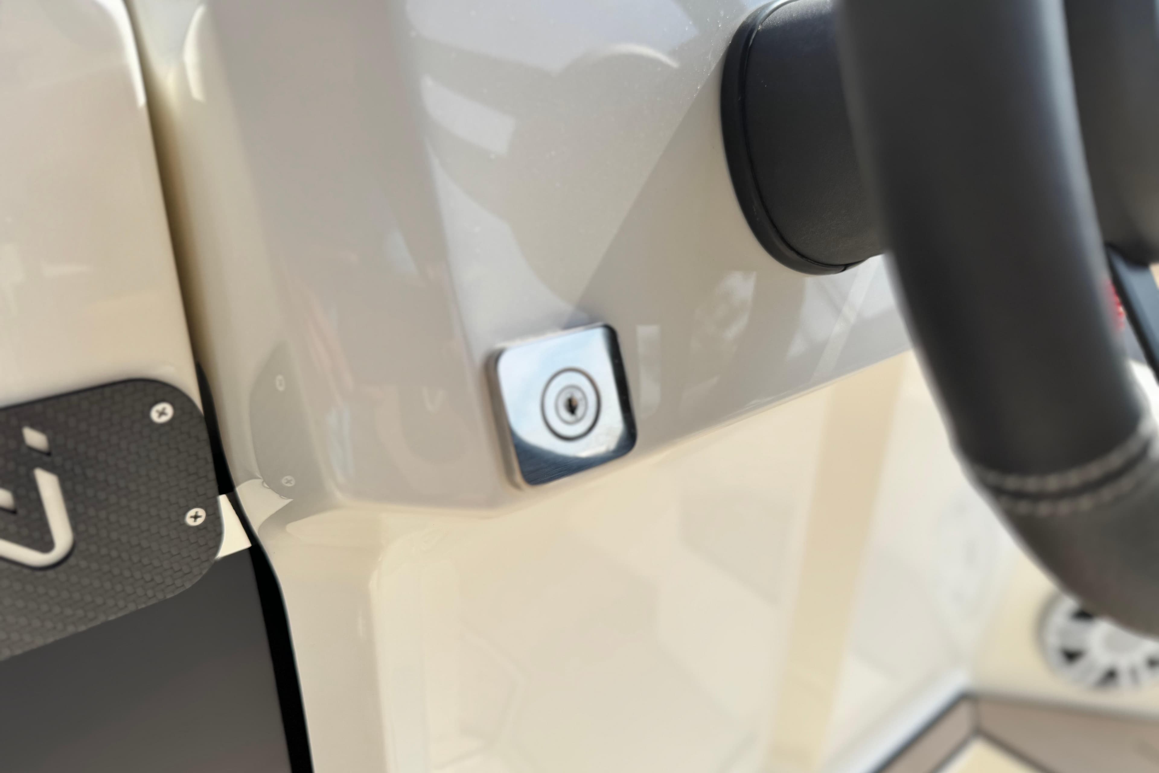 Close-up of 2025 Nuova Jolly Prince 30 Sport Cabin dashboard with steering wheel detail.