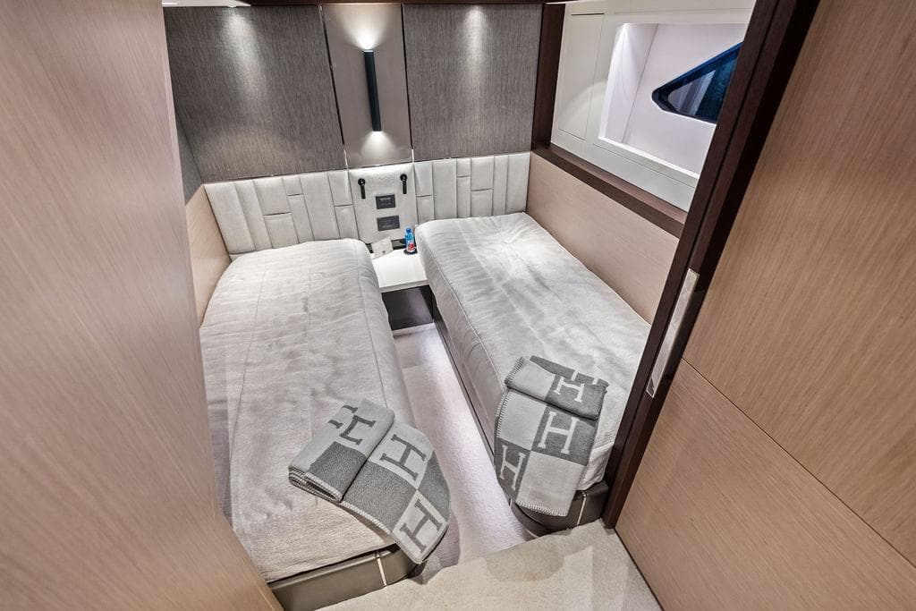 Luxurious twin cabin interior of 2021 Sunseeker Manhattan 68 yacht.