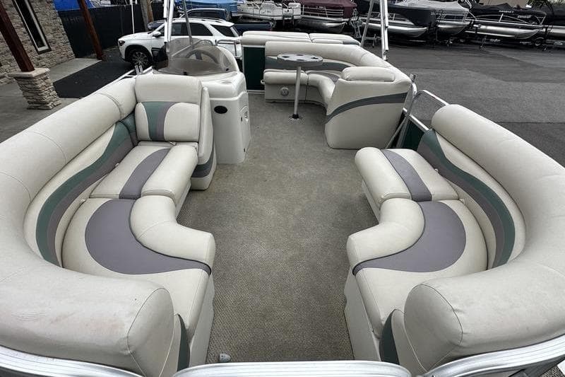2011 South Bay 420 CR pontoon boat with spacious seating and modern design.