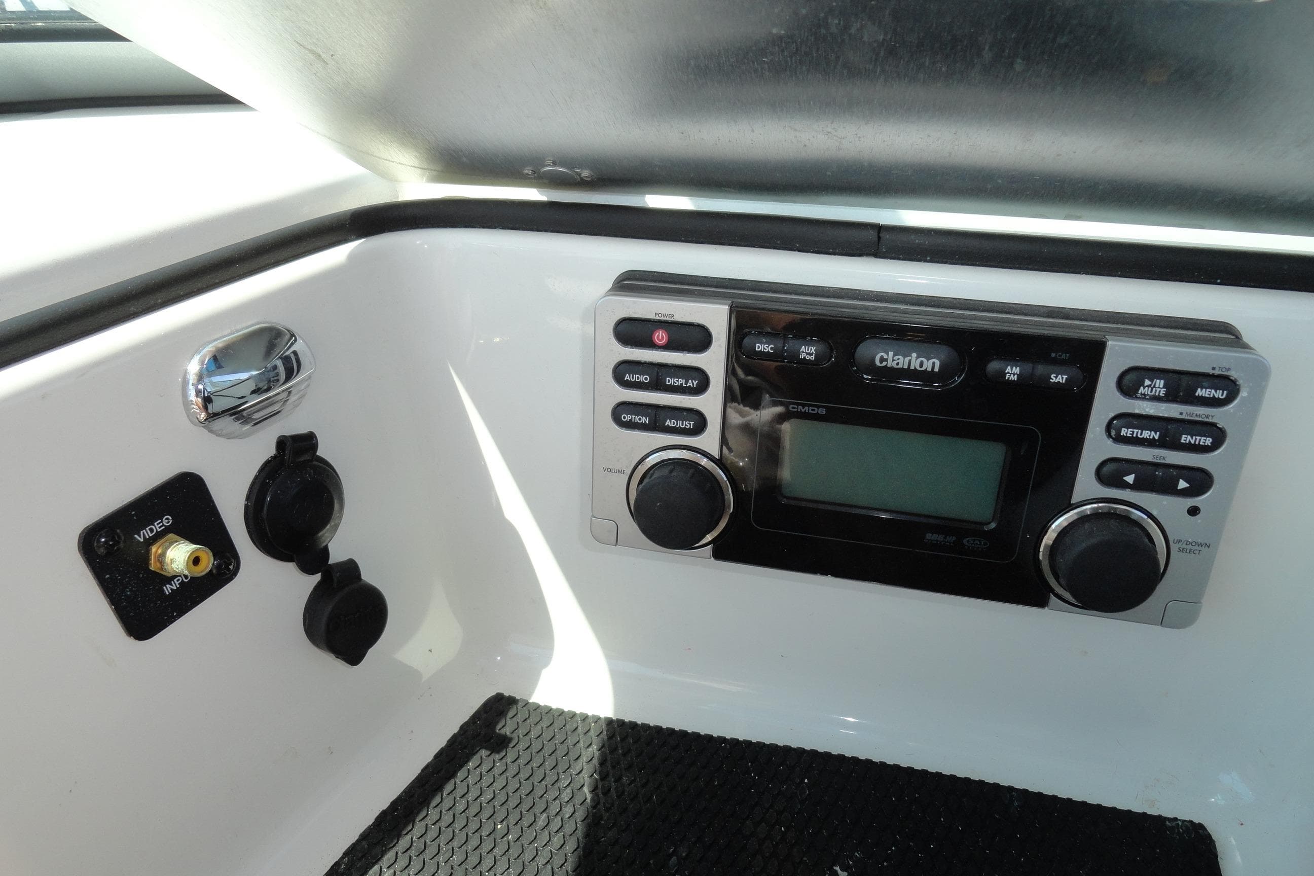 2013 MasterCraft X-10 boat dashboard with Clarion audio system and video input.