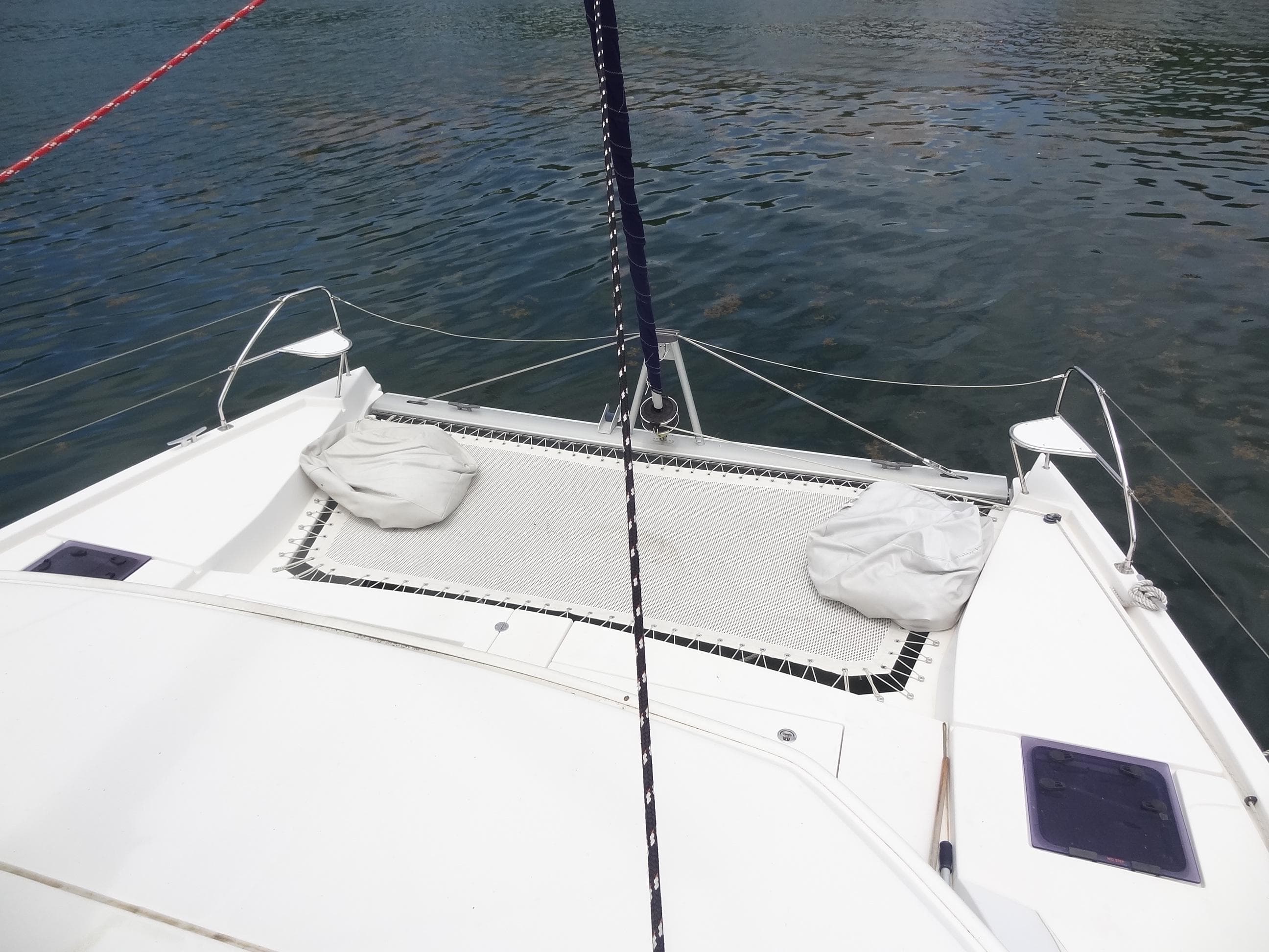 Leopard 40 catamaran 2020 model, front deck with netting over water.
