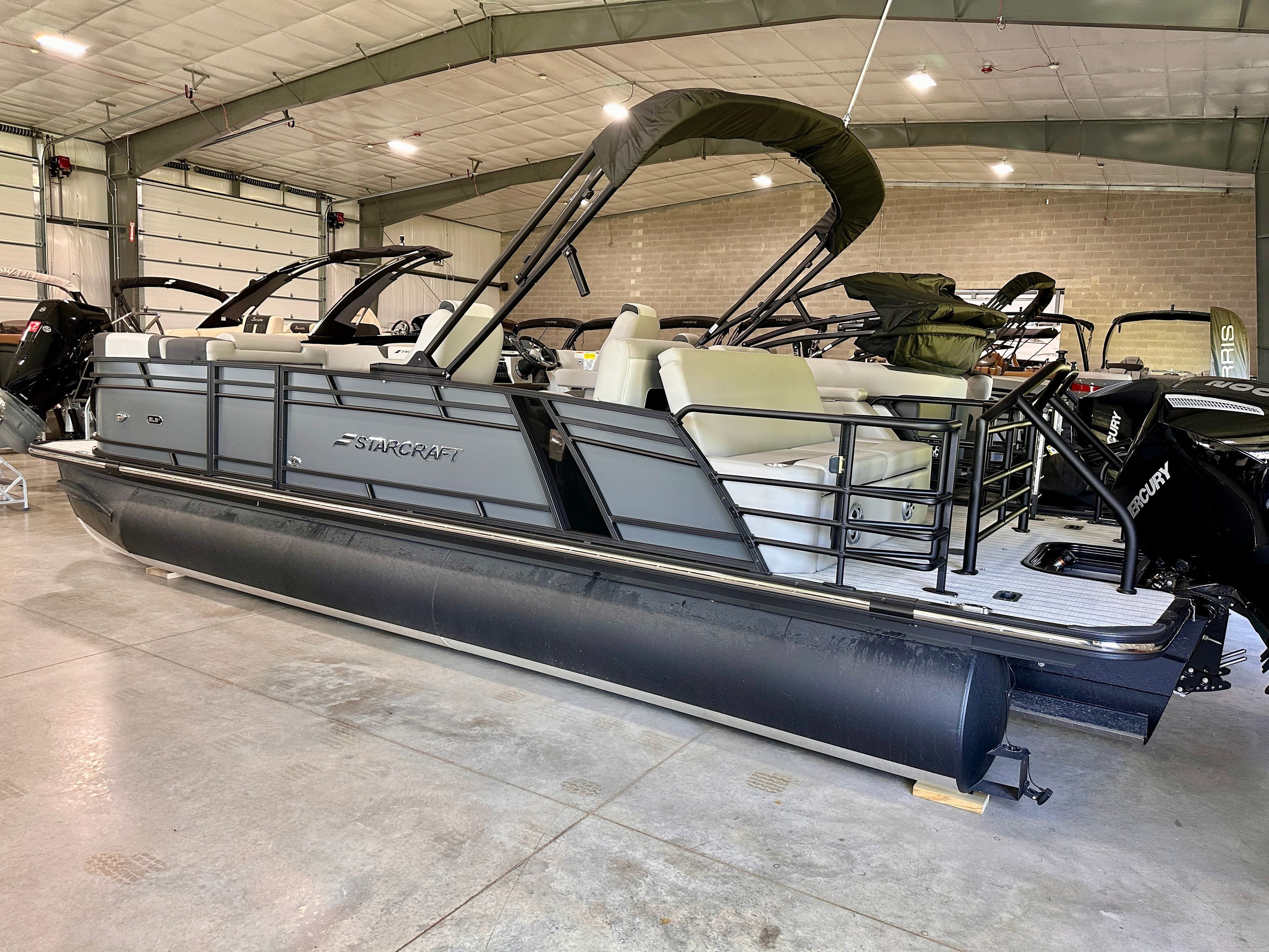 2026 Starcraft SLS 3 Q DH pontoon boat in warehouse.