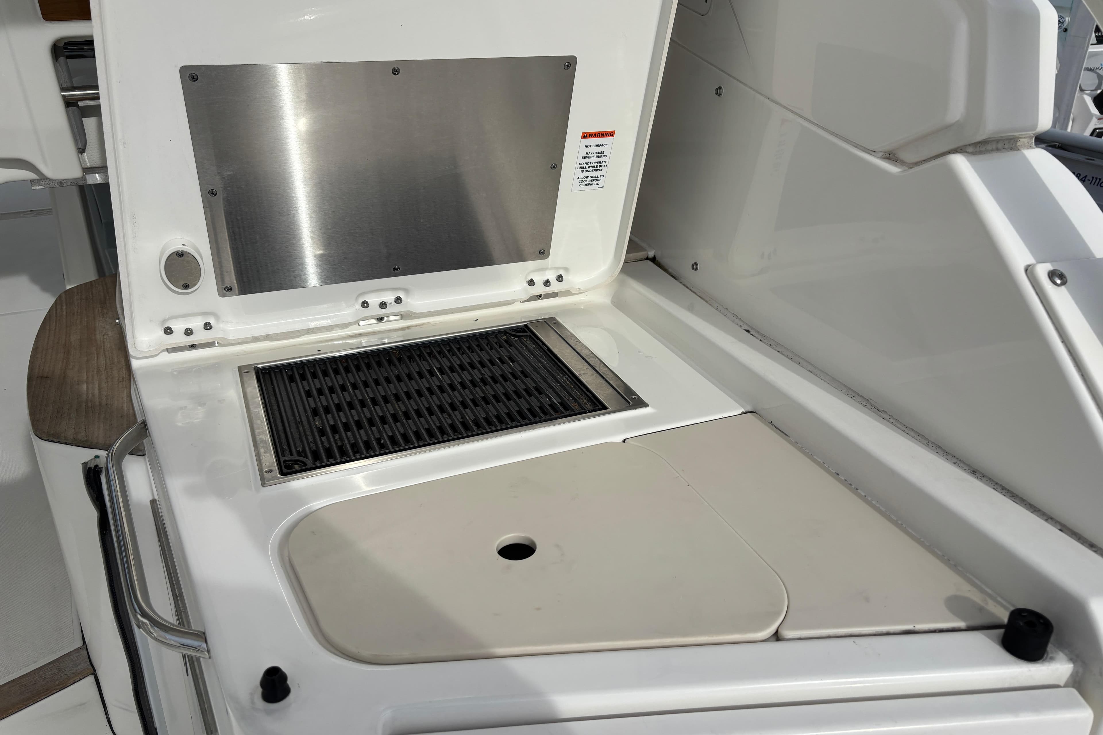 2022 Pursuit DC 365 Dual Console boat grill and prep area.