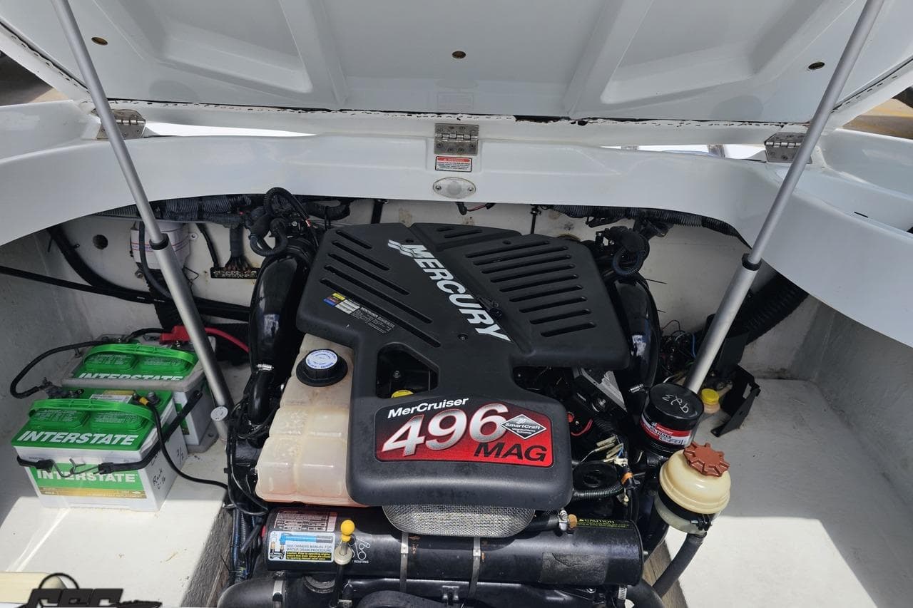 2004 Baja H2X boat engine compartment featuring a MerCruiser 496 MAG engine.