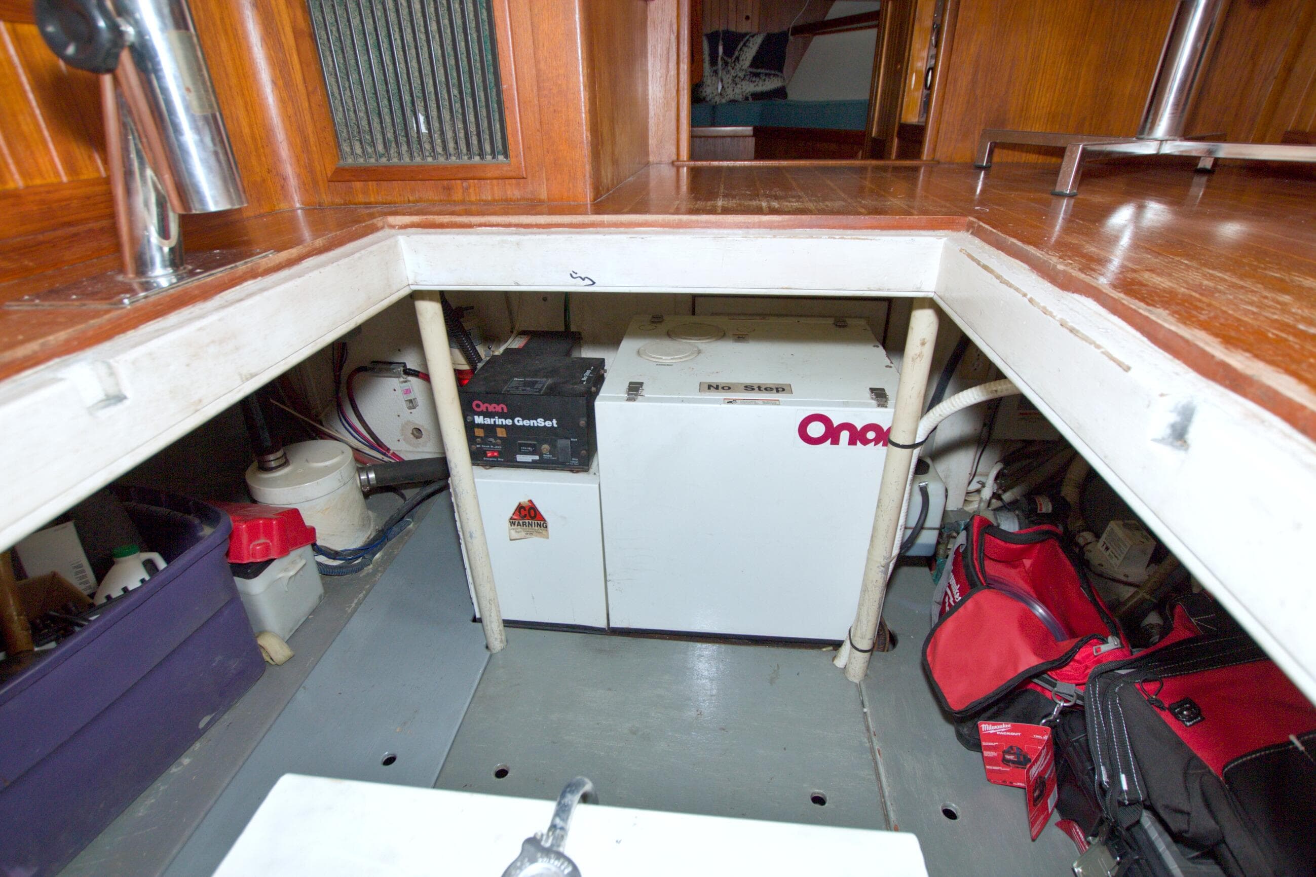 Engine room of a 1999 Monk 36 Trawler with Onan Marine GenSet.