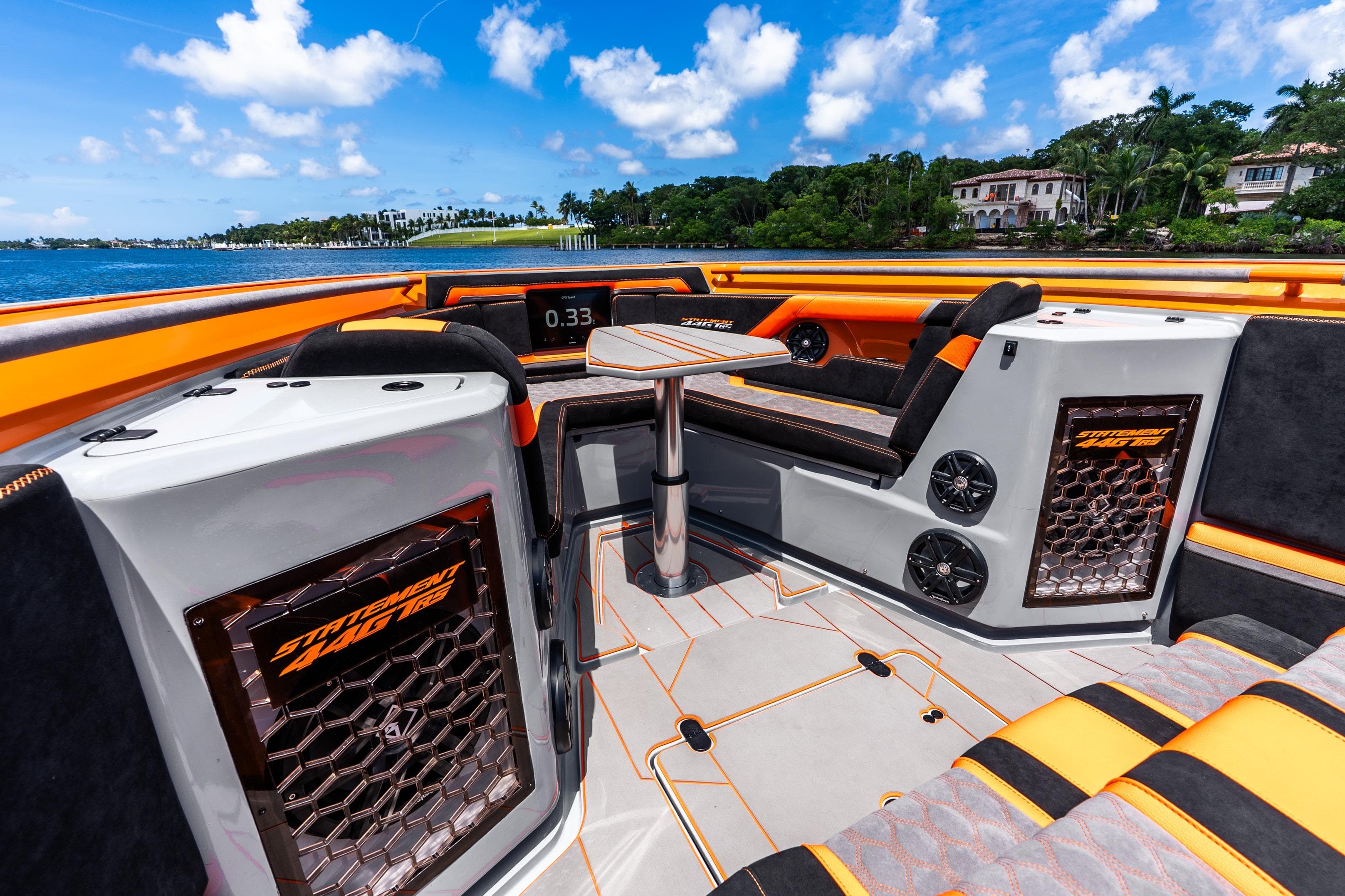Luxurious 2025 Statement 44 GRTS boat interior with vibrant orange accents and modern design.