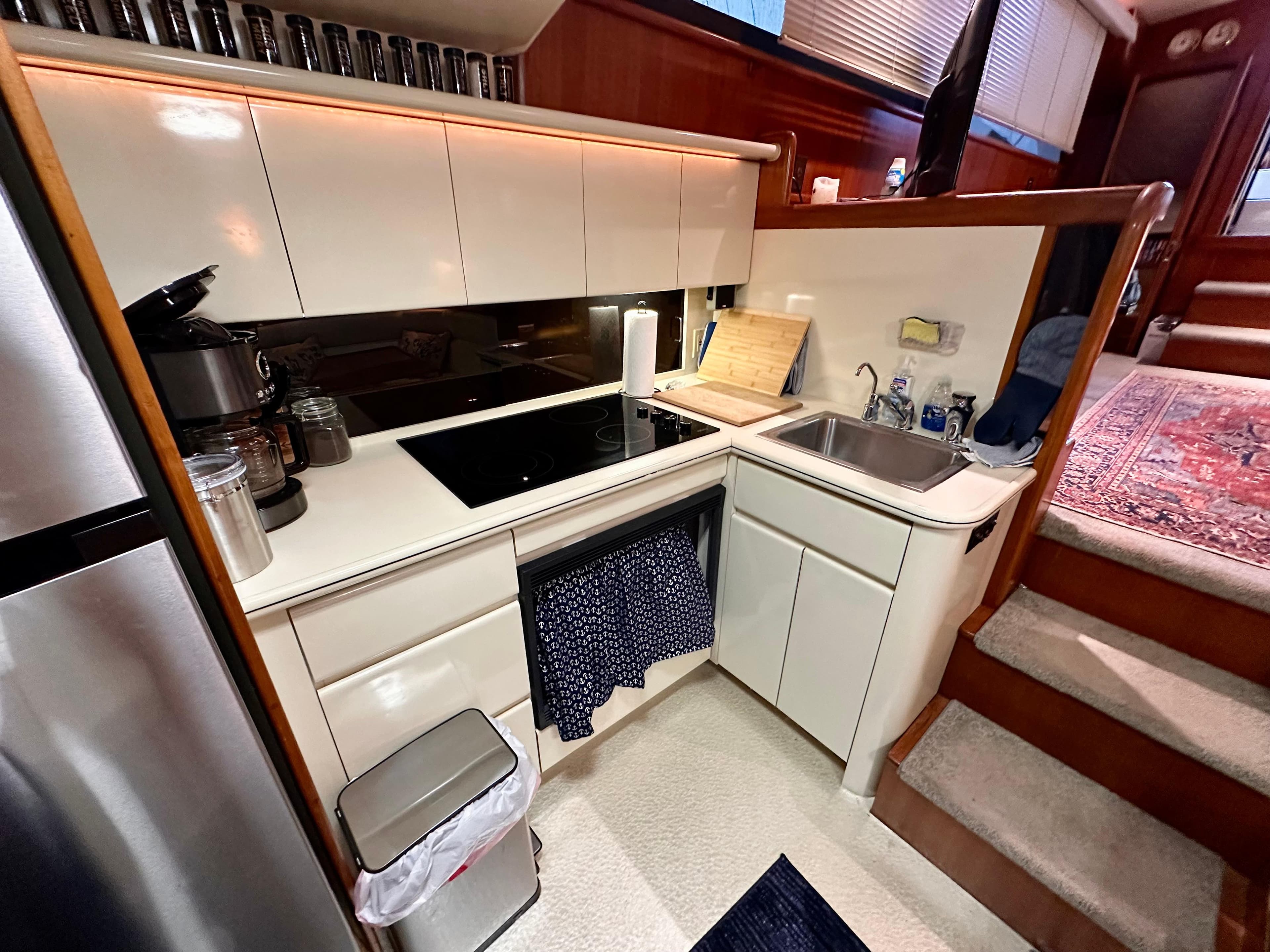 1989 Viking 44 Motor Yacht kitchen with modern appliances and sleek cabinetry.