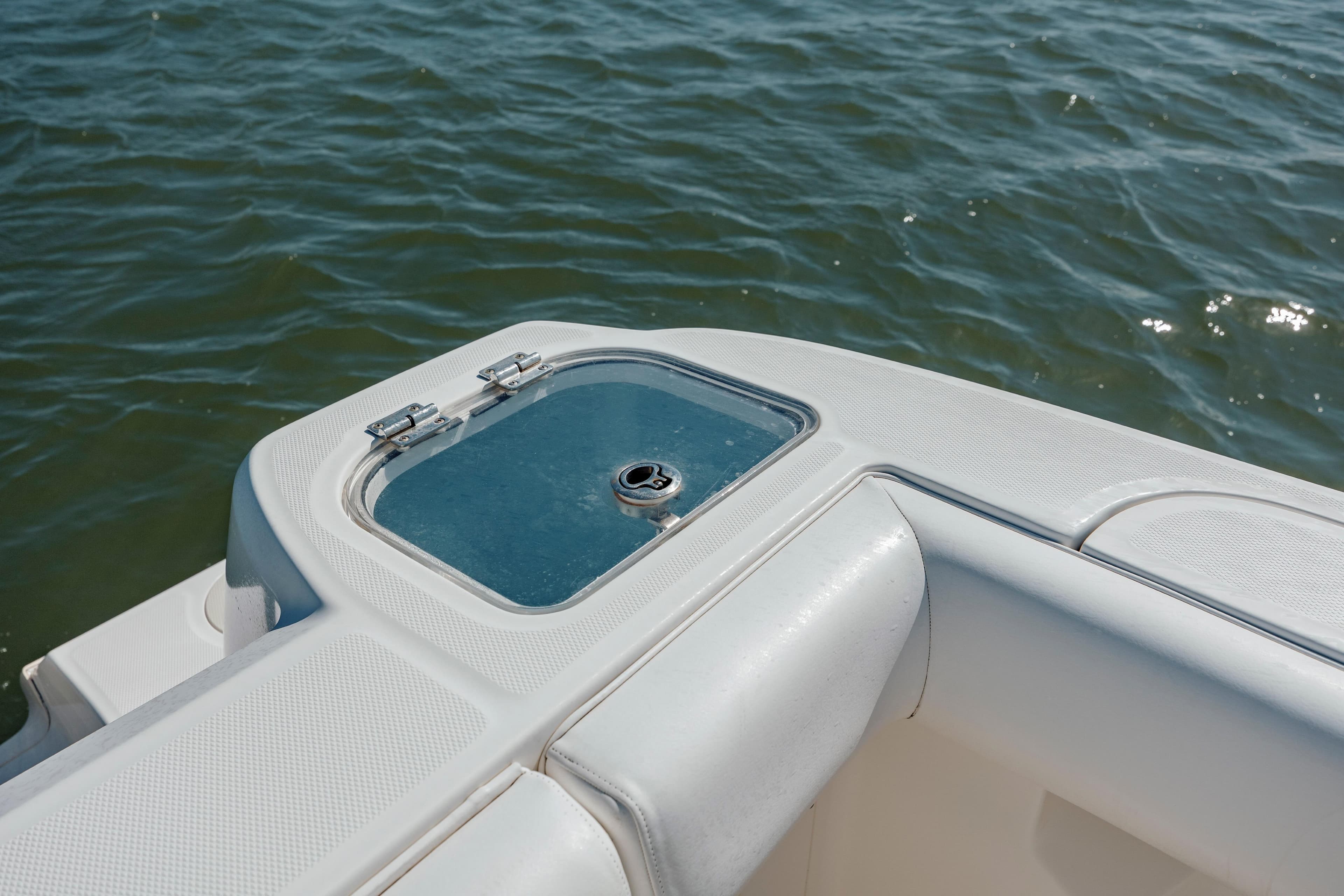 2013 Boston Whaler 320 Outrage boat detail with water in background.