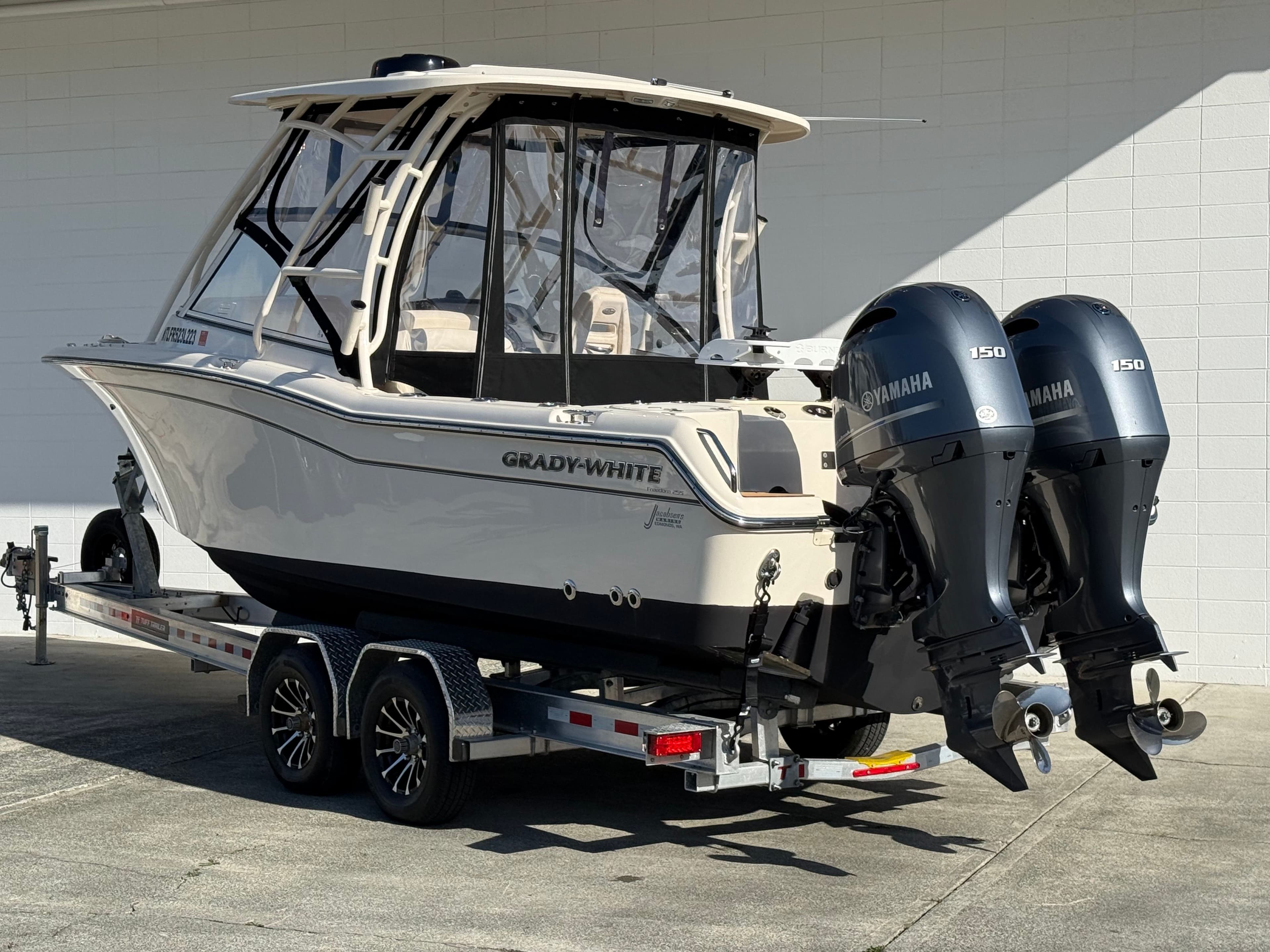 2023 Grady-White Freedom 255 boat with Yamaha engines on trailer.