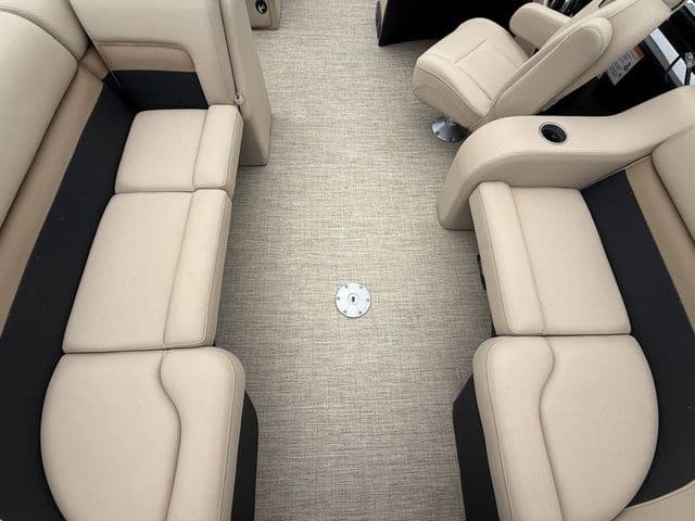 Interior of 2020 Barletta Boats C20Q with beige seating and carpeted floor.