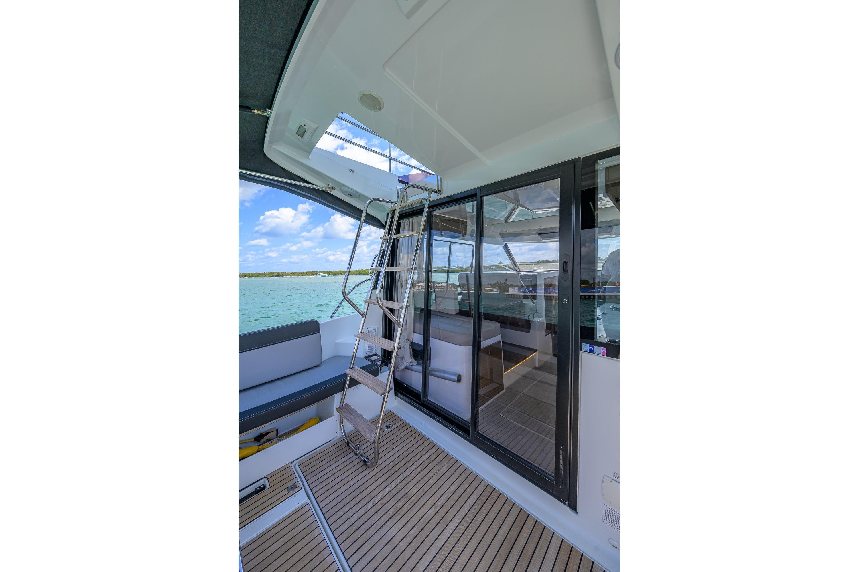 2022 Jeanneau NC Weekender 1095 Fly, featuring sleek deck and modern interior design.