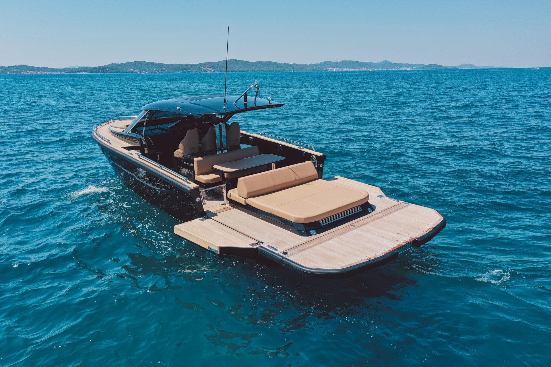 Luxury Focus Forza 37 yacht cruising on open sea, 2025 model.