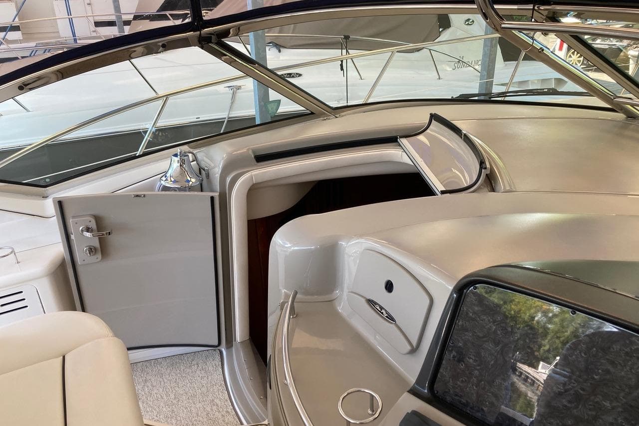 2008 Sea Ray 44 Sundancer yacht interior with open cabin door and sleek design.