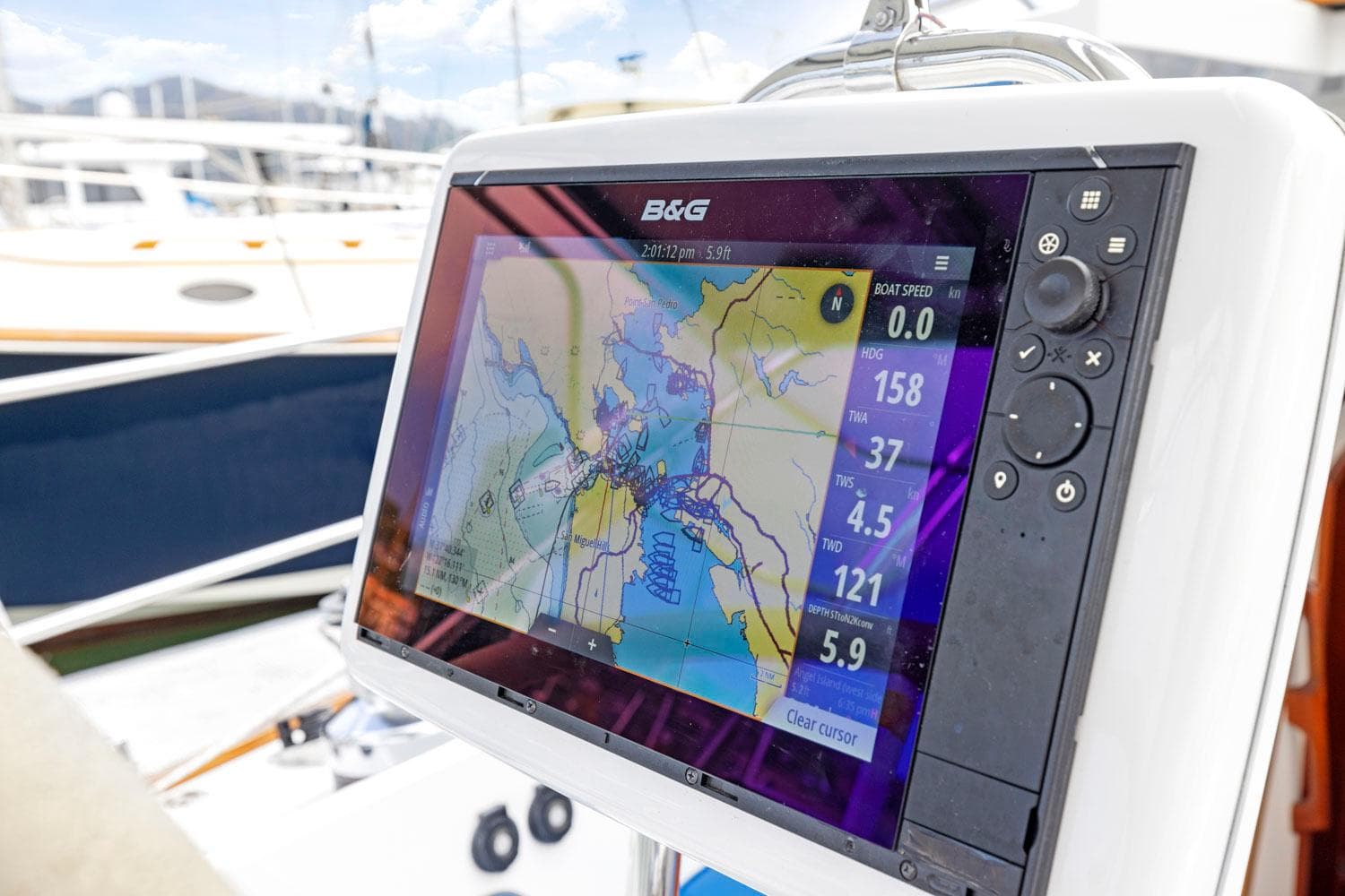 Boat navigation system on Morris 486, 2005 model, displaying nautical map and data.