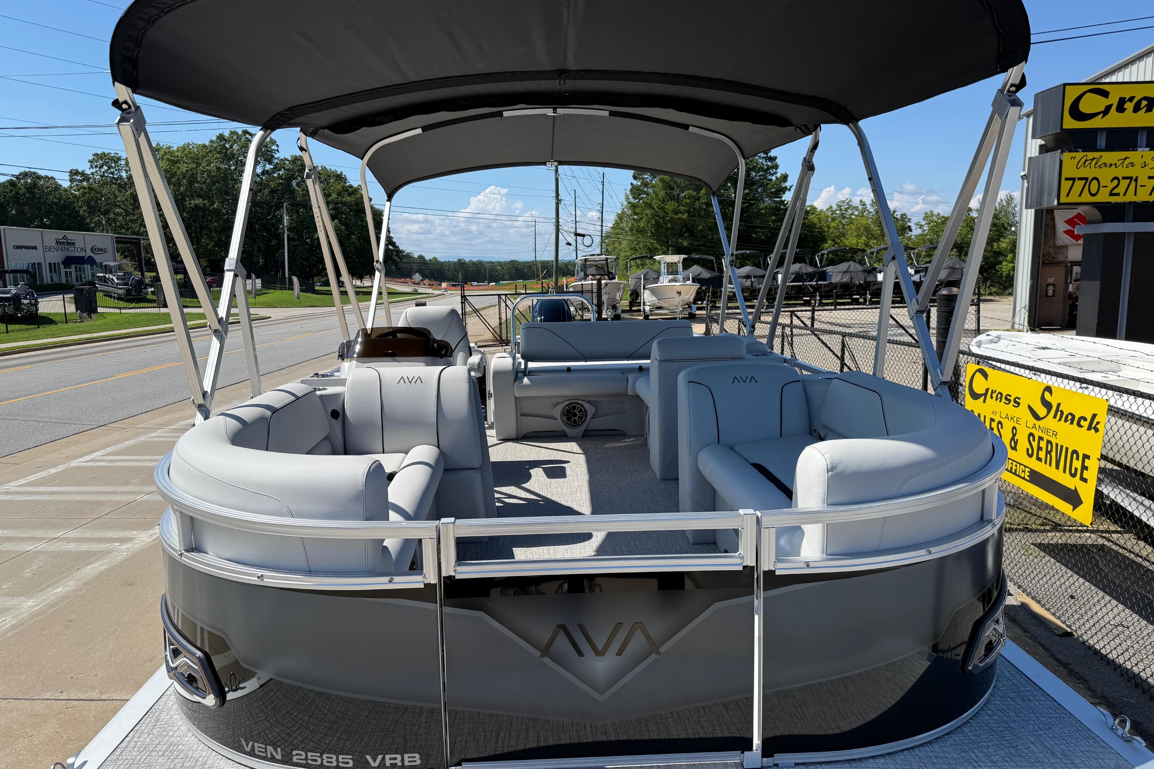 2026 Avalon Venture 85 Versatile Rear Bench pontoon boat with sleek design and spacious seating.