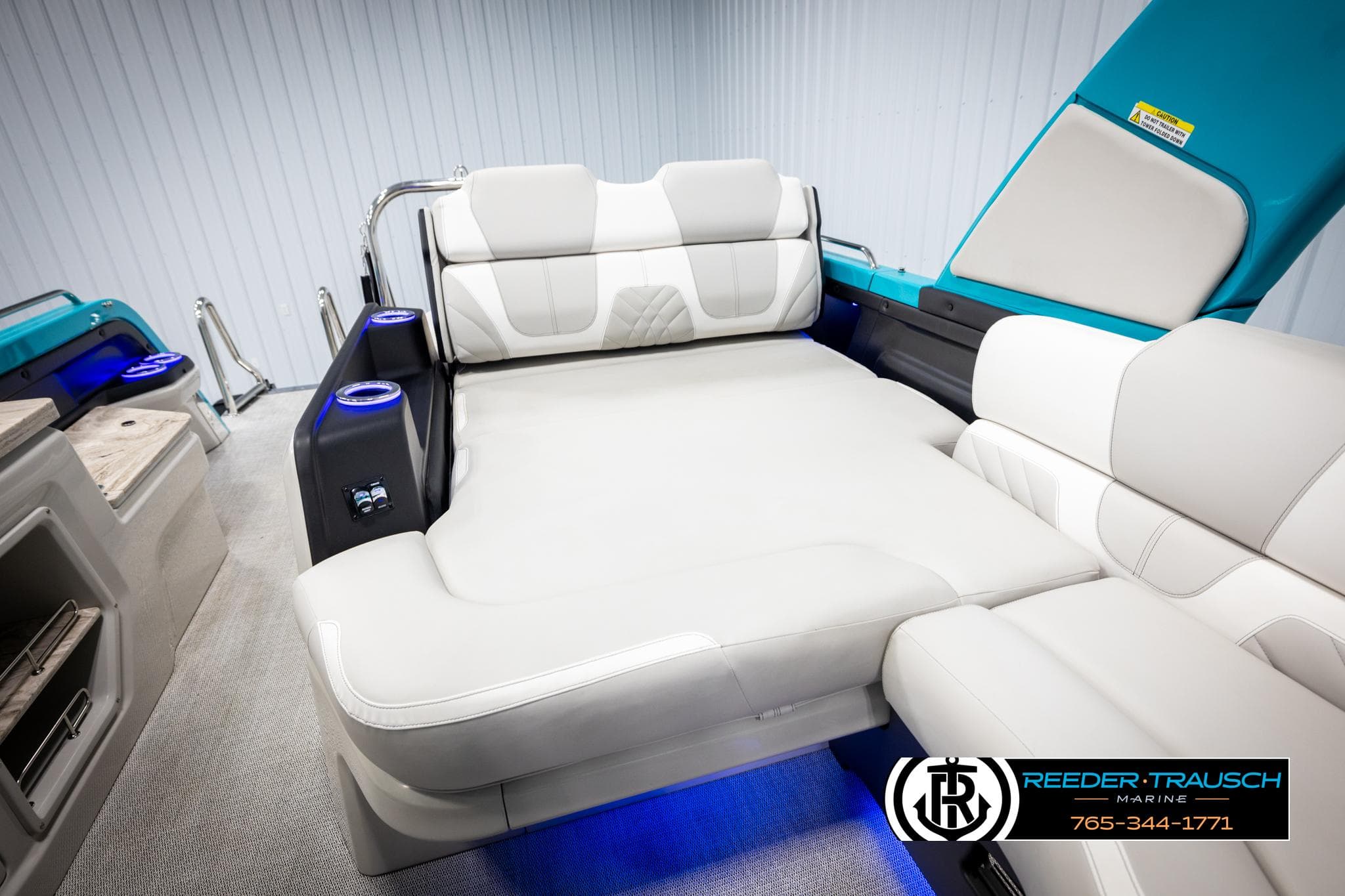 Luxurious seating on 2025 Avalon 2585 Excal VRBW boat with modern design and ambient lighting.