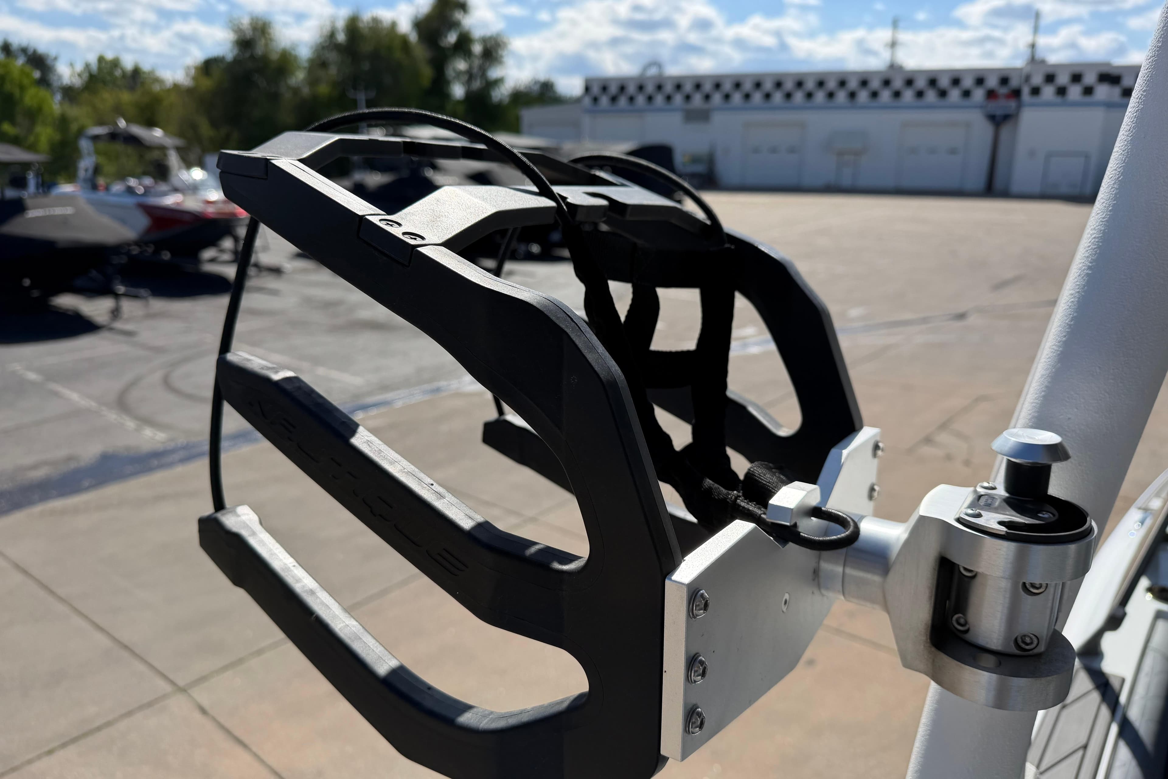 2025 Nautique Super Air Nautique GS24 wakeboard rack in a sunny outdoor setting.