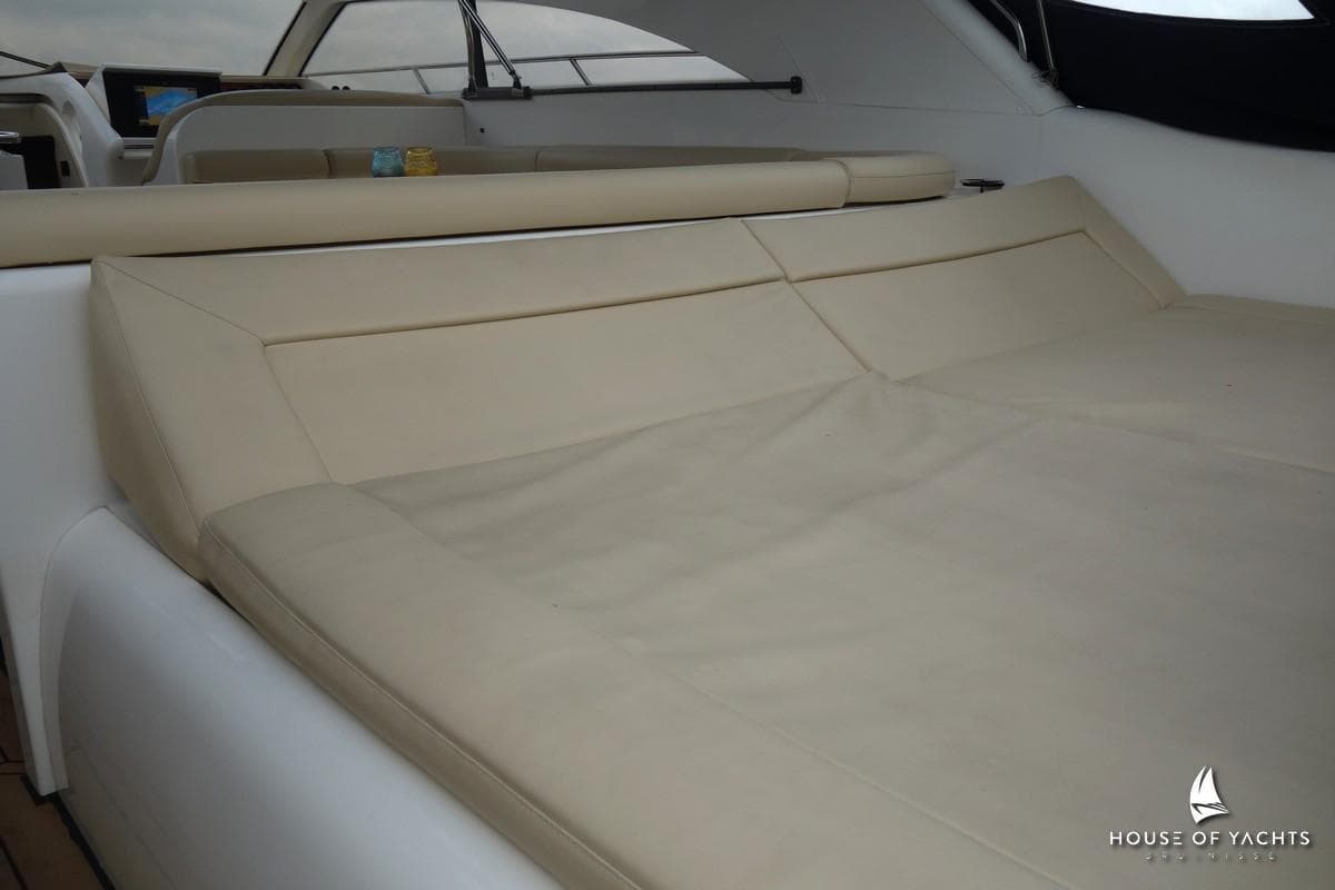 Luxurious beige seating on a 1996 Princess V52 yacht deck.
