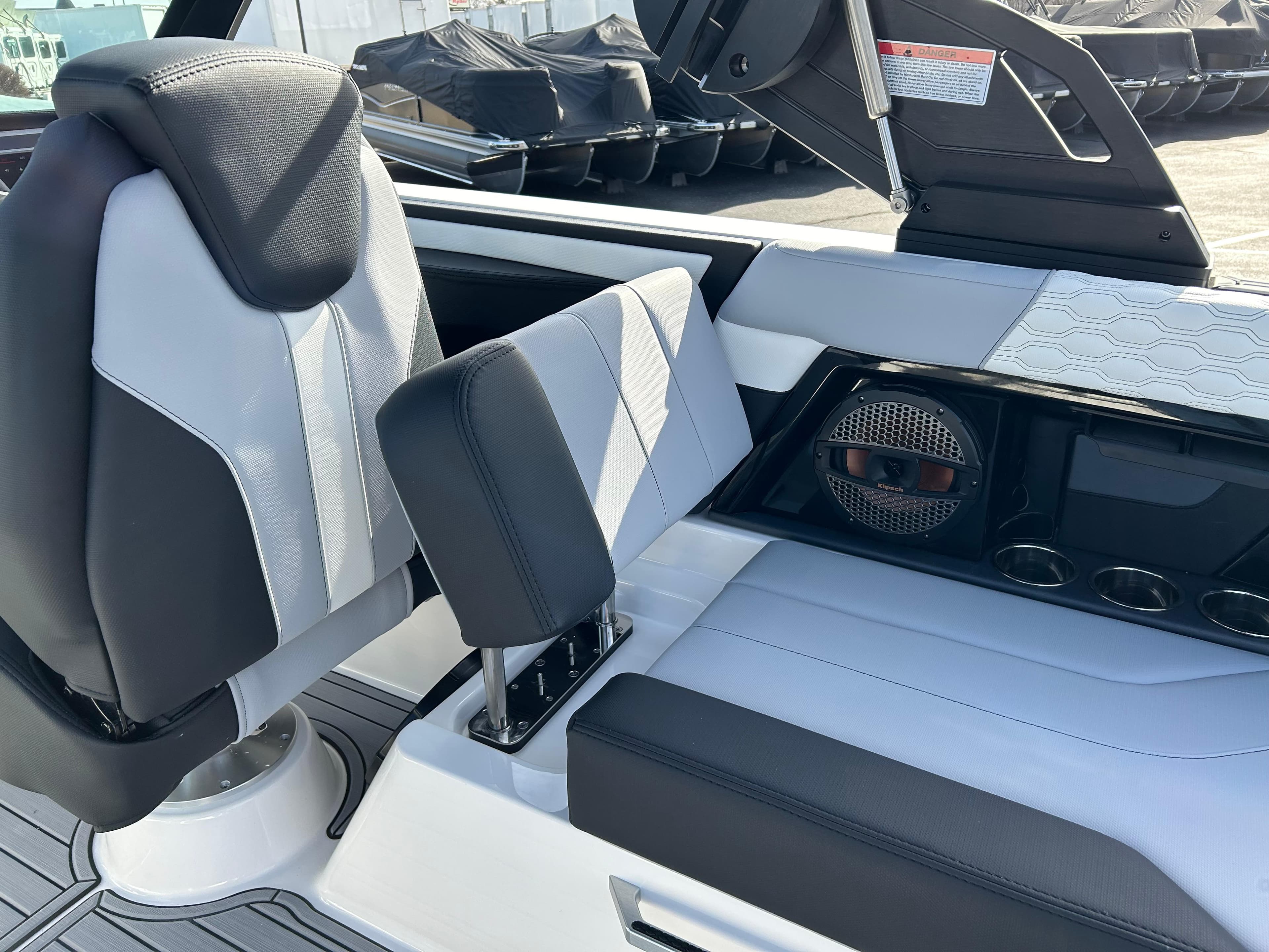 2024 MasterCraft XT22 boat interior with premium seating and audio system.