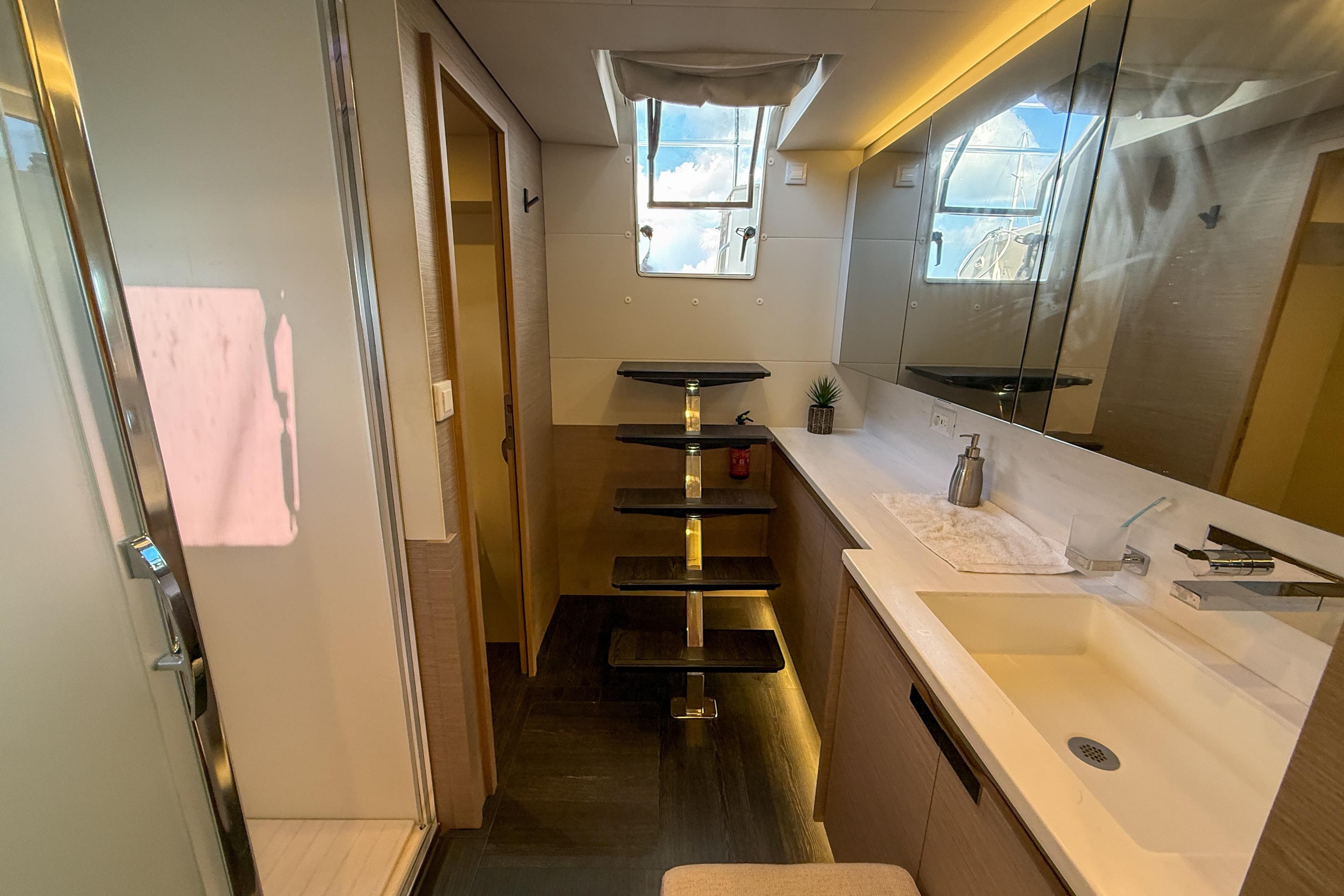 Luxurious bathroom interior of 2021 Fountaine Pajot Samana 59 yacht with modern fixtures.
