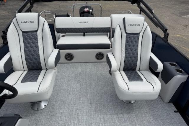 2025 Harris Sunliner 230 boat interior with luxurious seating and modern design.