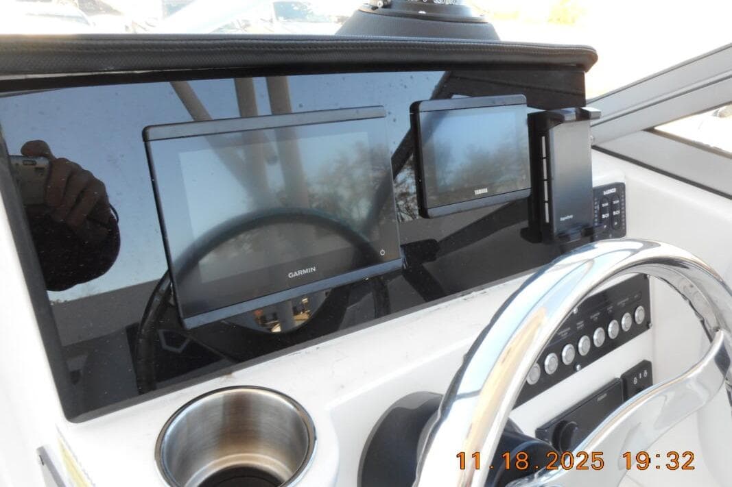 Dashboard of 2026 Sea Fox 228 Traveler boat with Garmin and Yamaha displays.