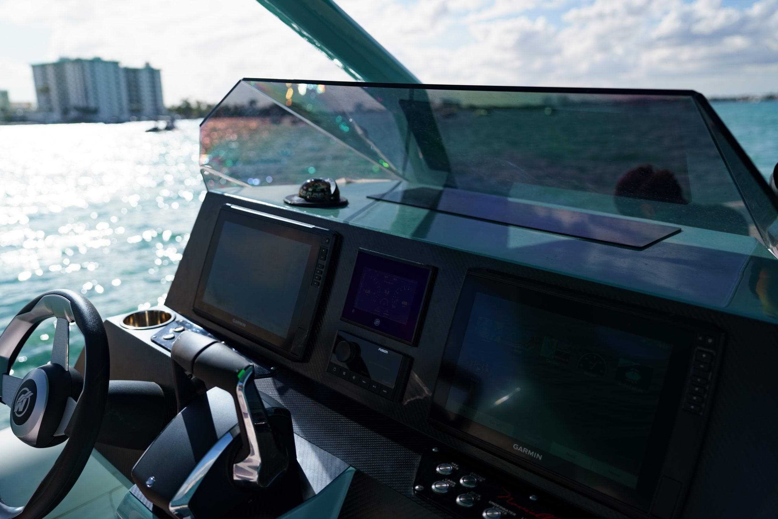 Cockpit of 2025 Novielli Veloche boat with modern navigation screens and steering wheel.