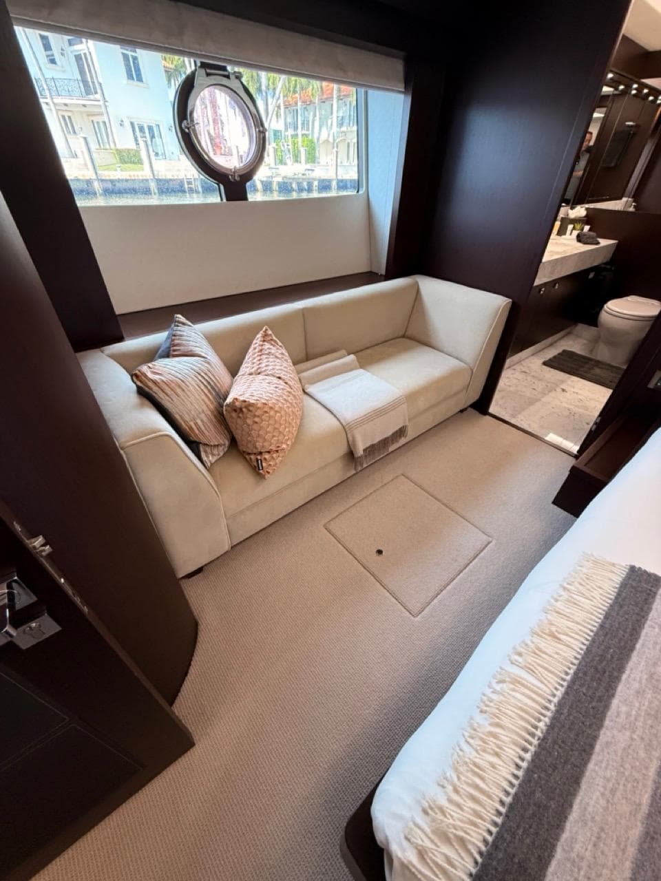 Luxurious interior of 2018 Sunseeker 86 Yacht with elegant seating and modern decor.