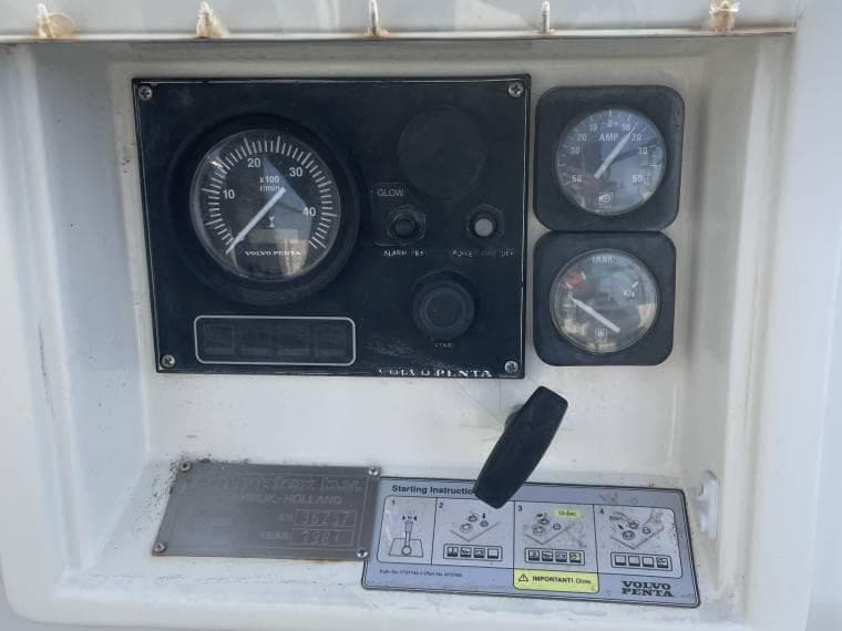 Control panel of a 1987 Contest Yachts 36 with Volvo Penta gauges and instructions.