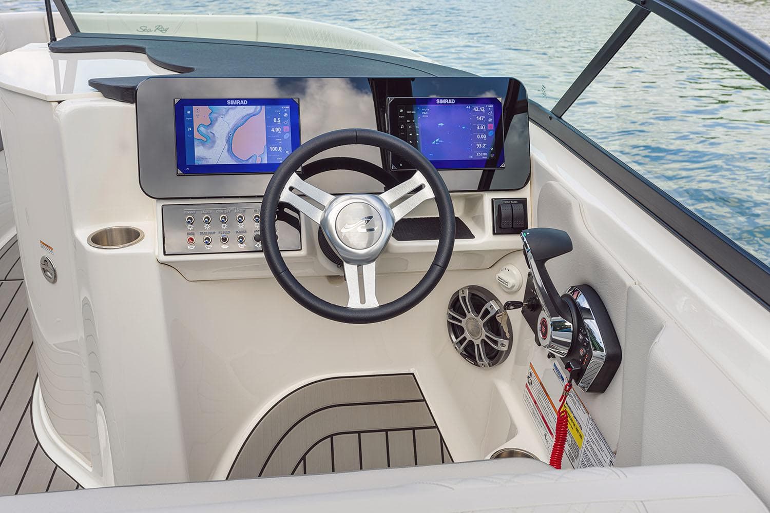 Manufacturer Provided Image: 2025 Sea Ray SDX 250 helm with dual navigation screens and modern controls.