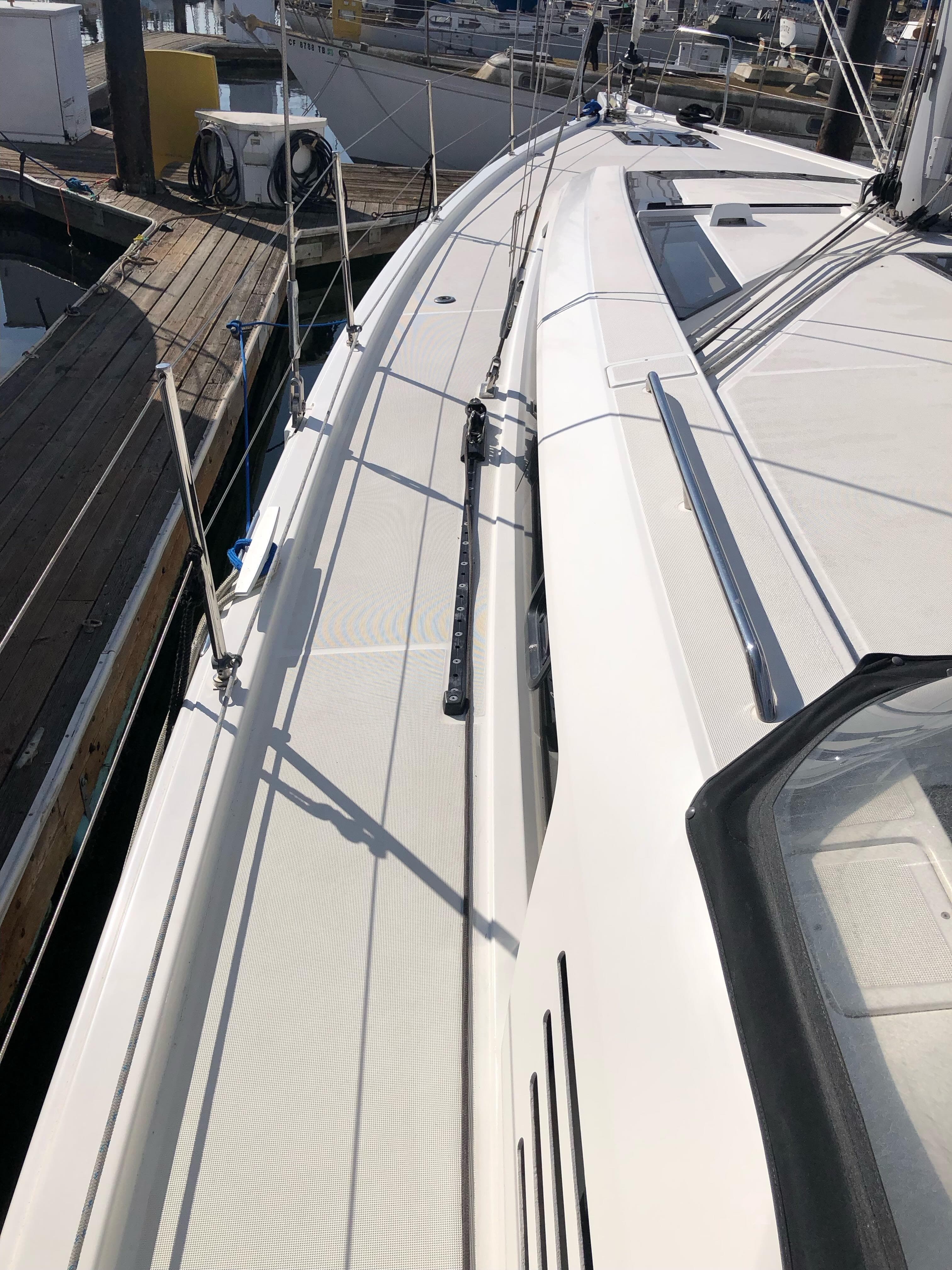 2019 Beneteau Oceanis 51.1 yacht deck, docked at marina.