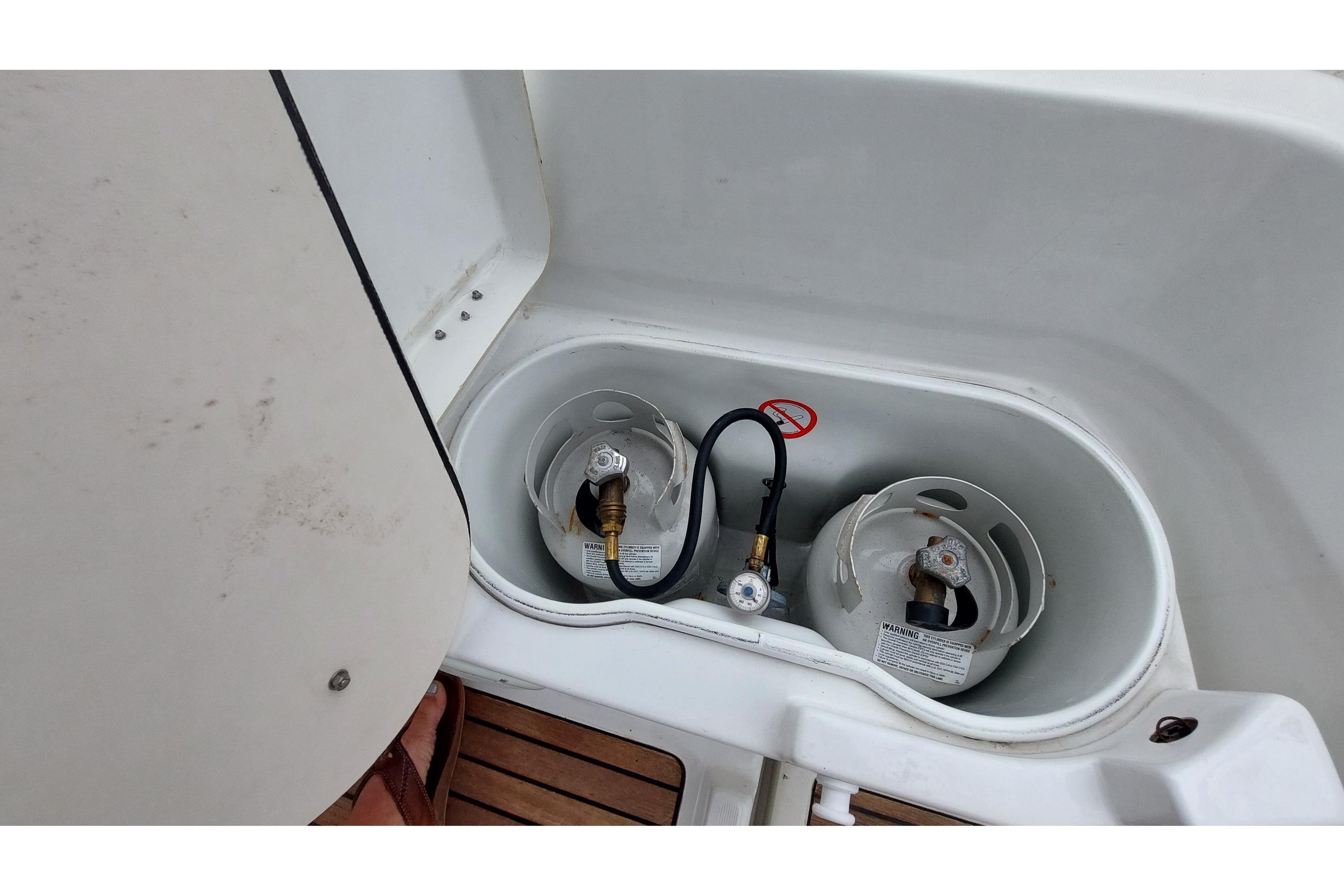 Gas cylinder storage on Jeanneau Sun Odyssey 43 DS, 2002 model.