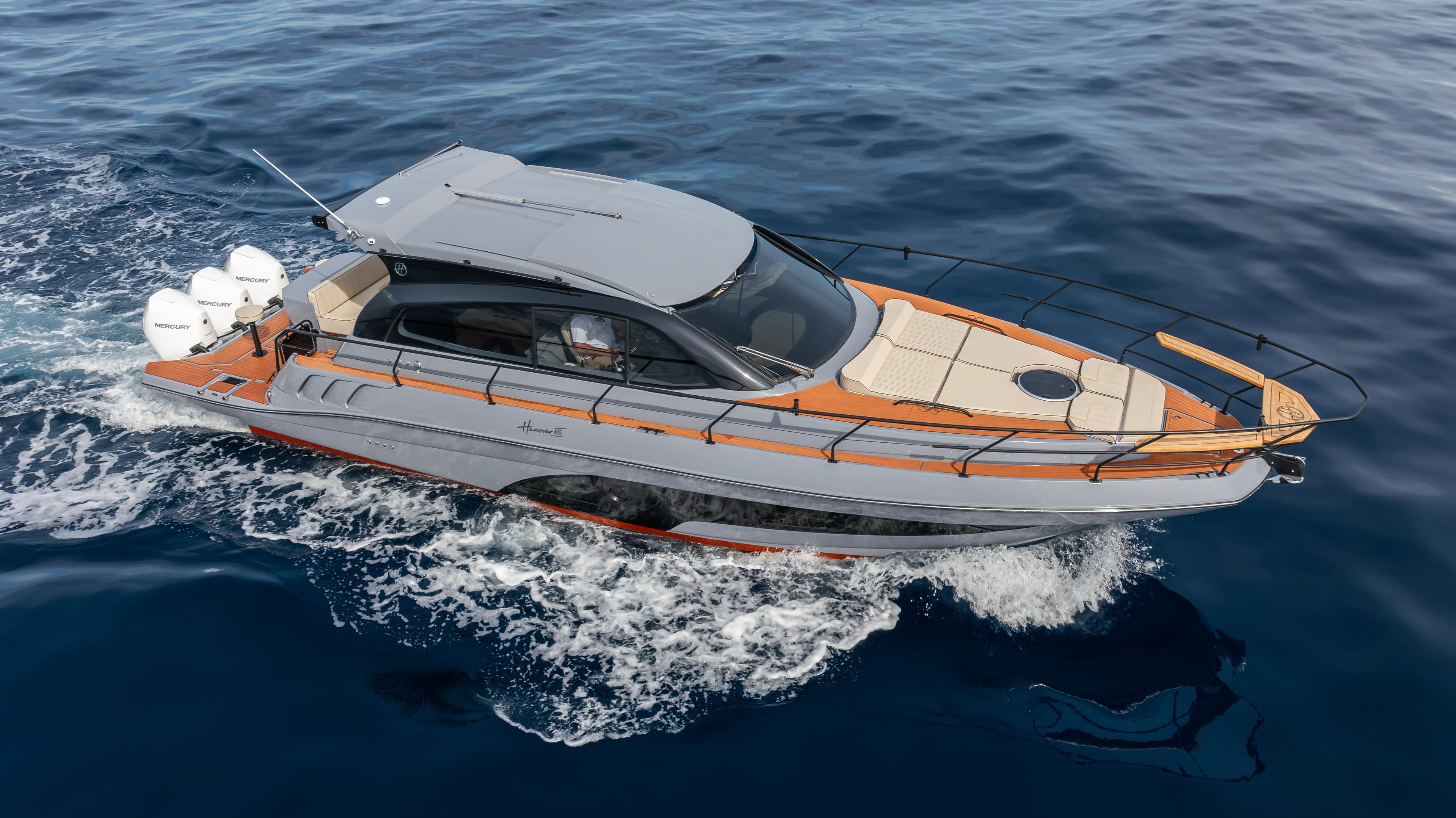 Sleek 2025 Hanover 415 yacht cruising on open water.