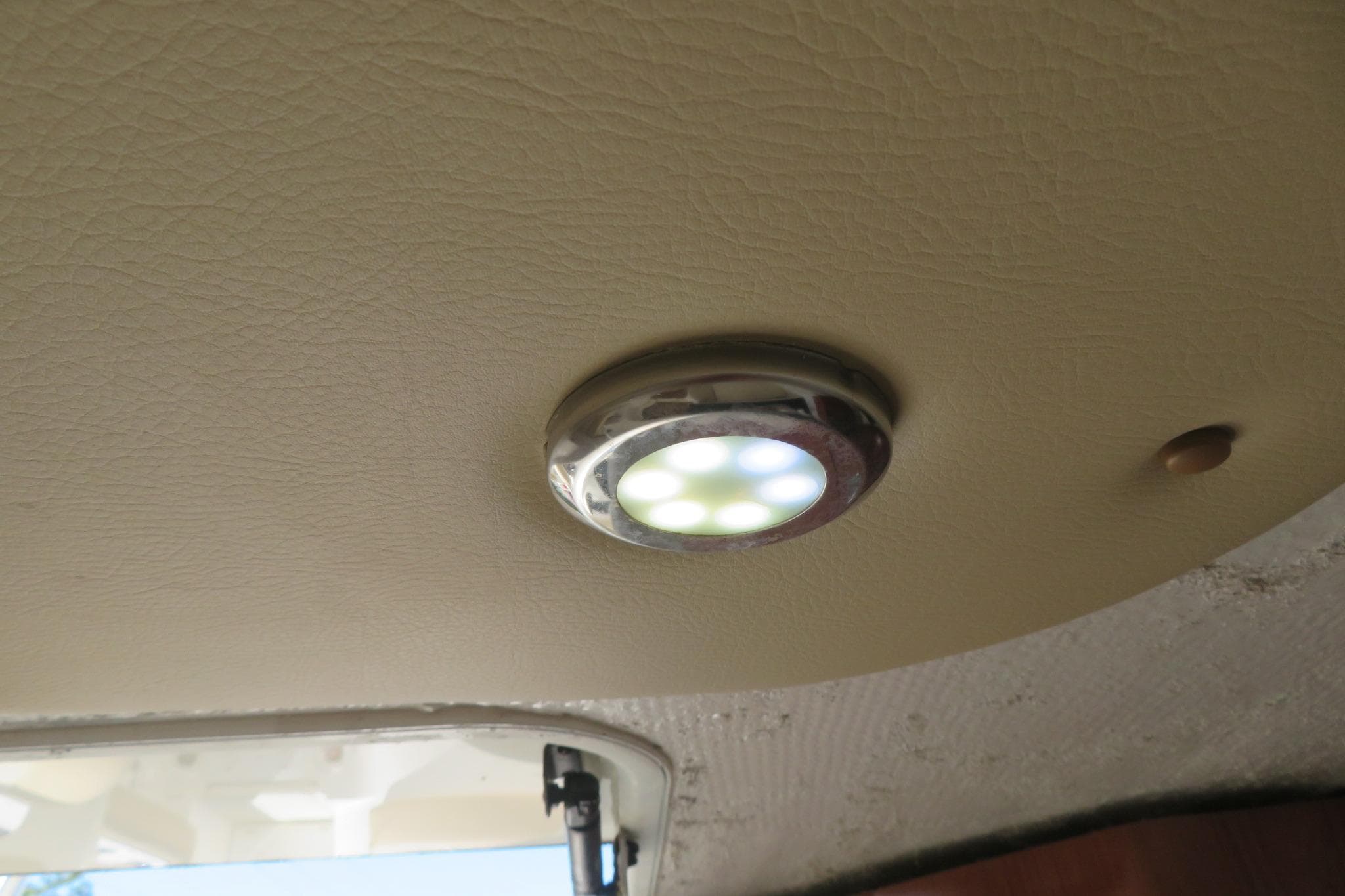 LED ceiling light inside a 2017 Sea Fox 256 Voyager boat cabin.