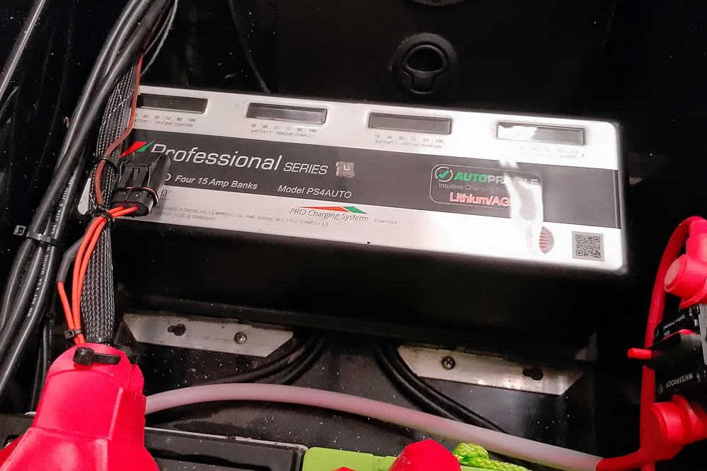 Battery charger in a 2024 Ranger 621FS Fisherman boat, featuring four 15 amp banks.