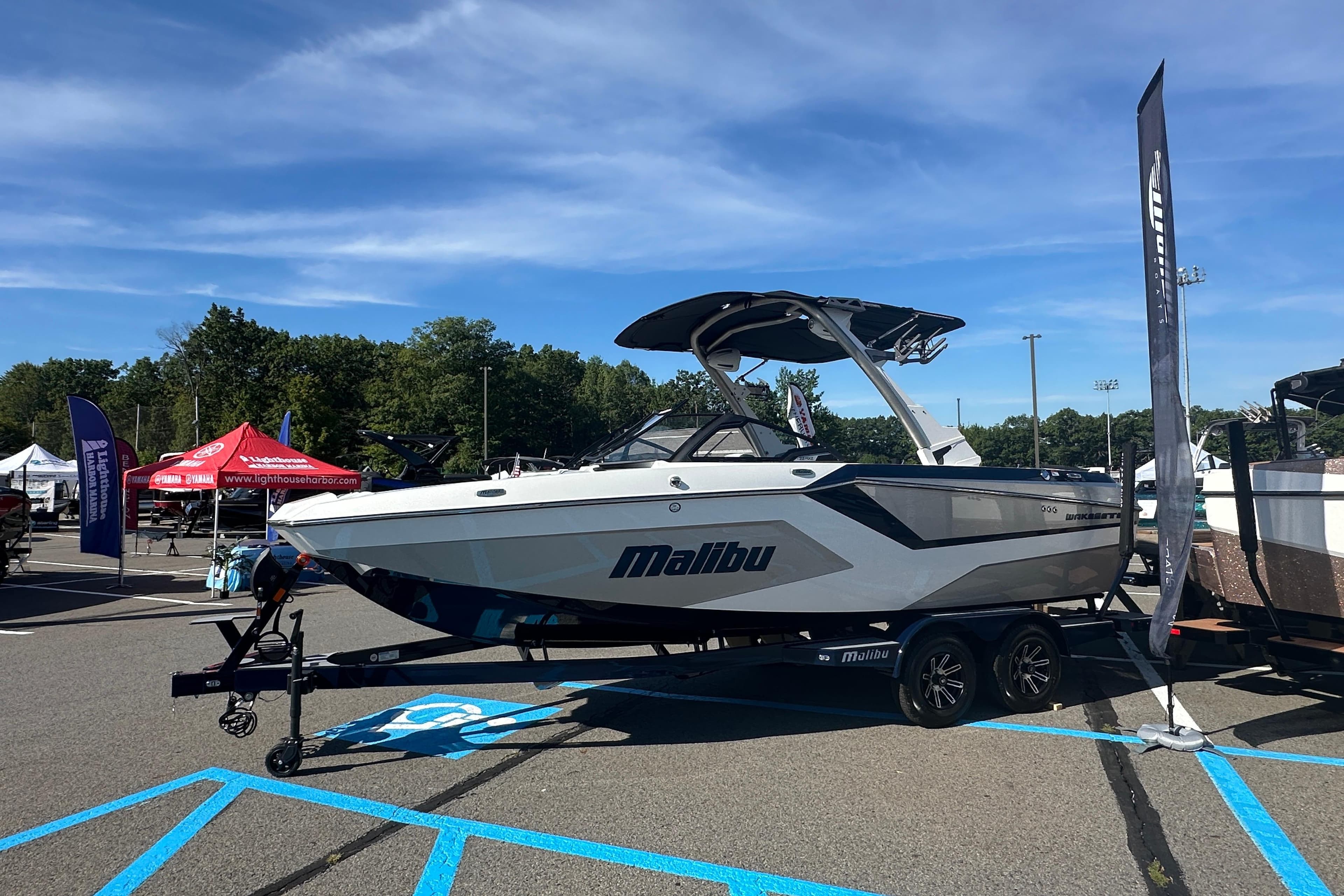 2025 Malibu Wakesetter 22 MXZ boat displayed outdoors on a trailer.