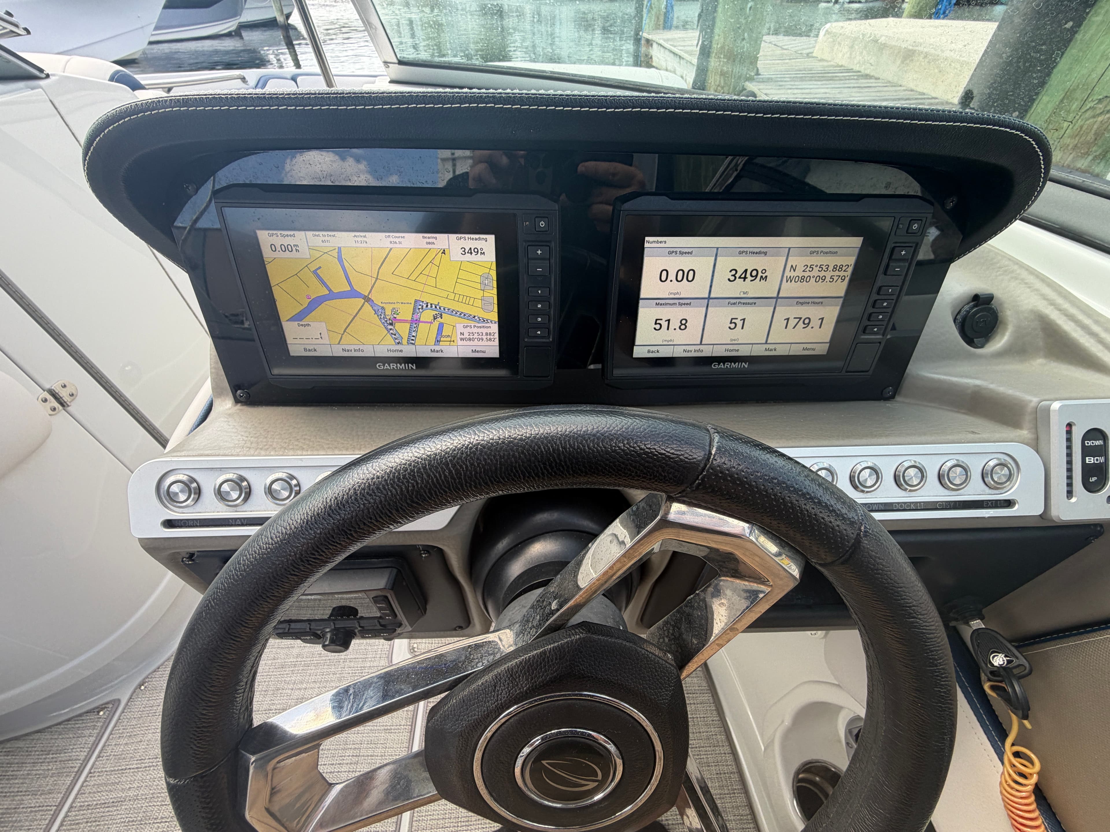 Crownline Eclipse E285 XS 2023 dashboard with Garmin GPS displays.