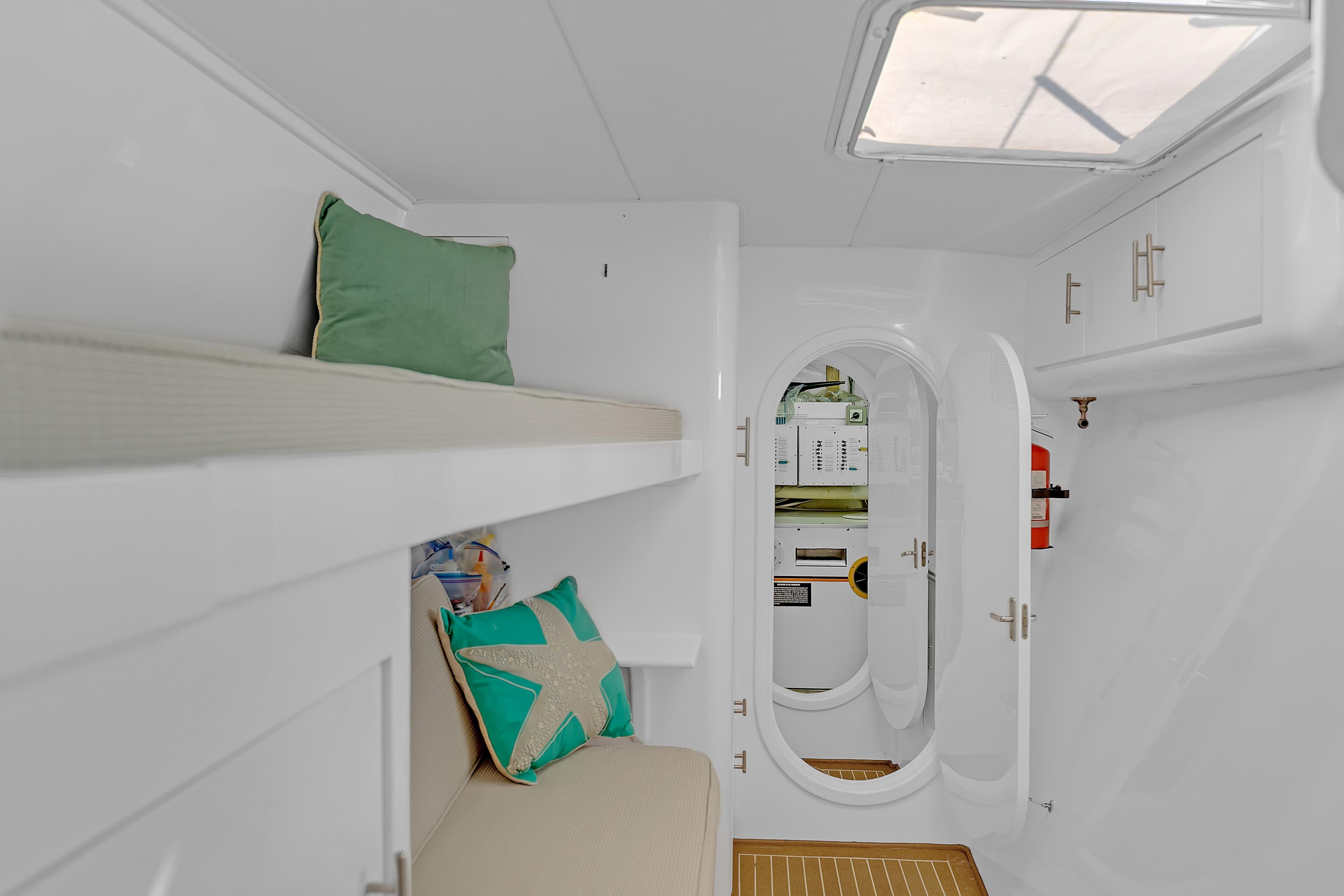 Interior of 1988 Kelsall Manannan Custom yacht with cozy seating and modern design.