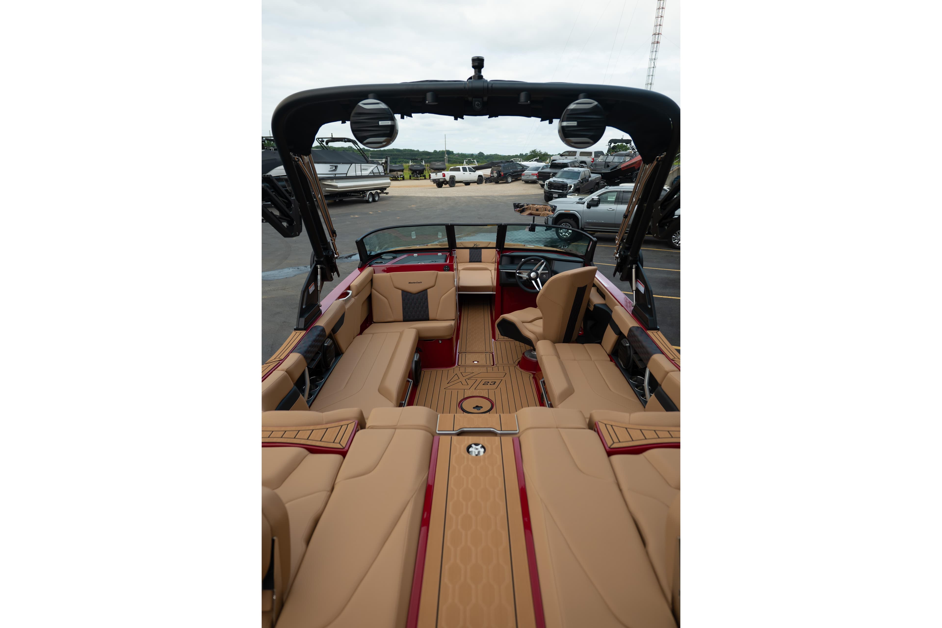 2026 MasterCraft XT23 boat interior with luxurious tan seating and modern design.