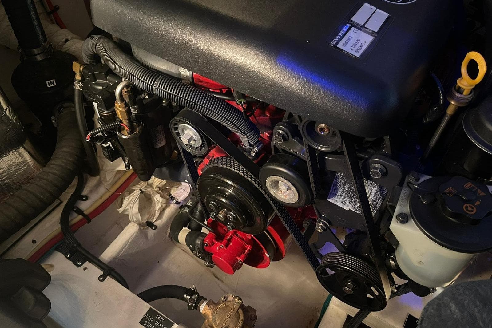Engine compartment of a 2011 Cruisers Yachts 300 Express, showcasing mechanical components.