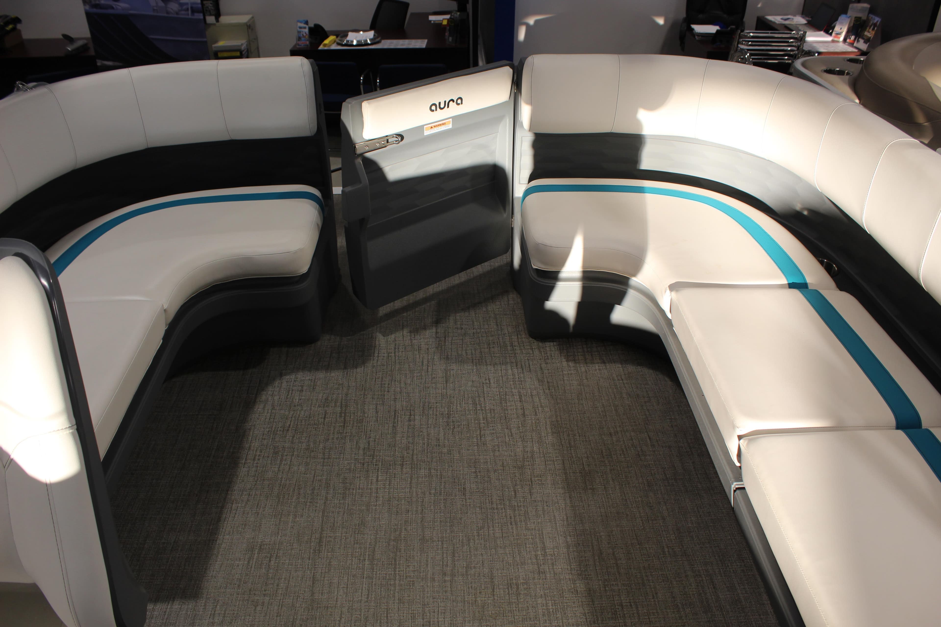 Luxurious seating on 2025 Avalon 2185 25 AURA QL pontoon boat, featuring modern design and comfort.