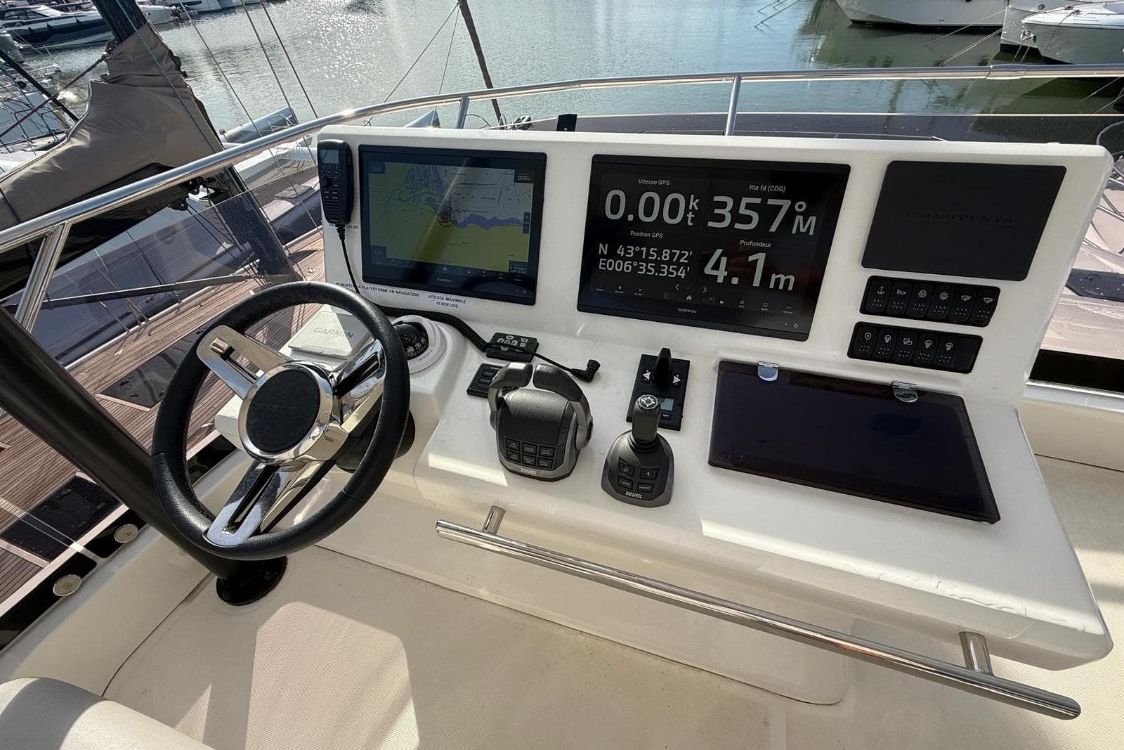 2024 Prestige M48 yacht helm with advanced navigation and control systems.