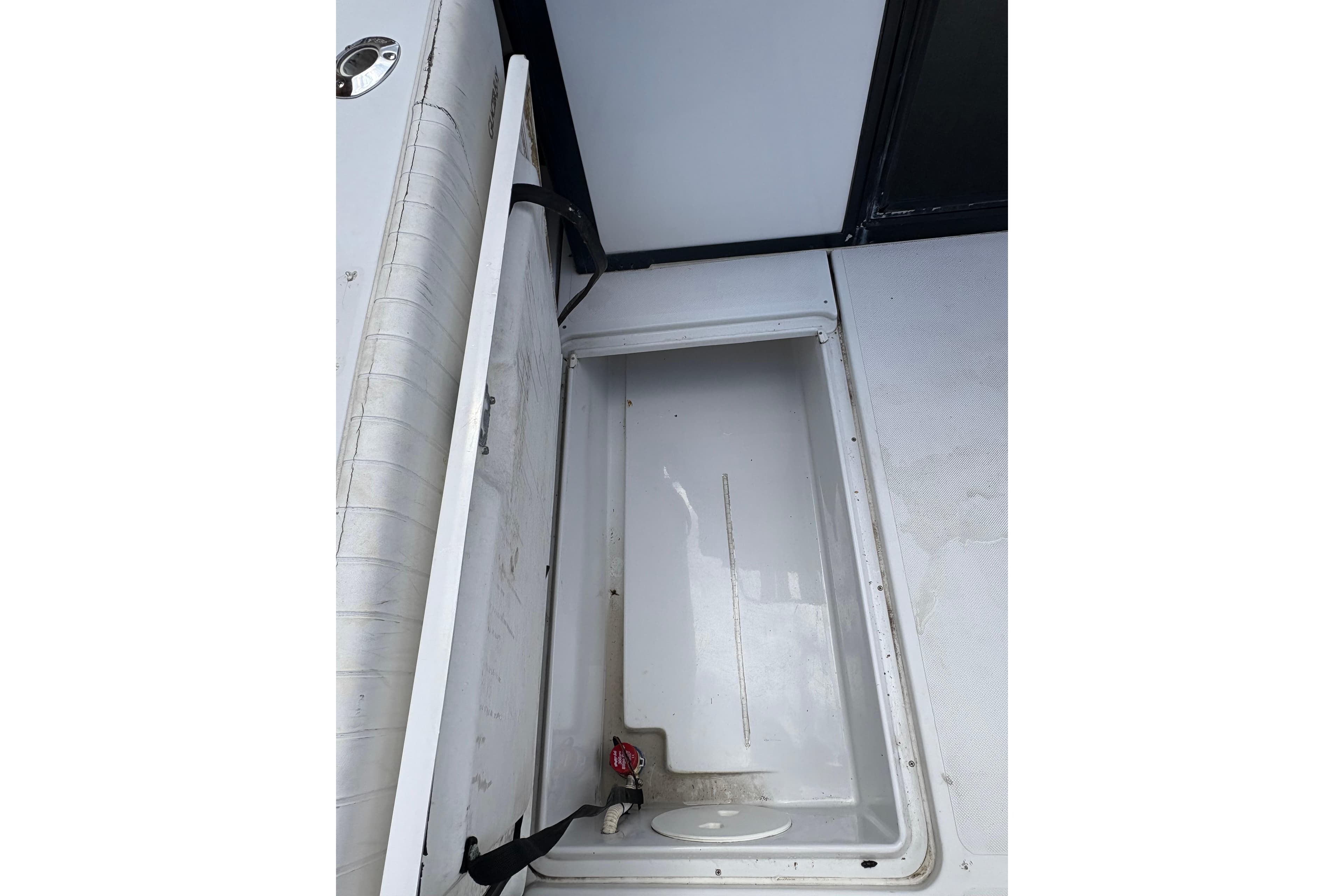 Open storage compartment on 2001 Glacier Bay 2690 Coastal Runner boat.