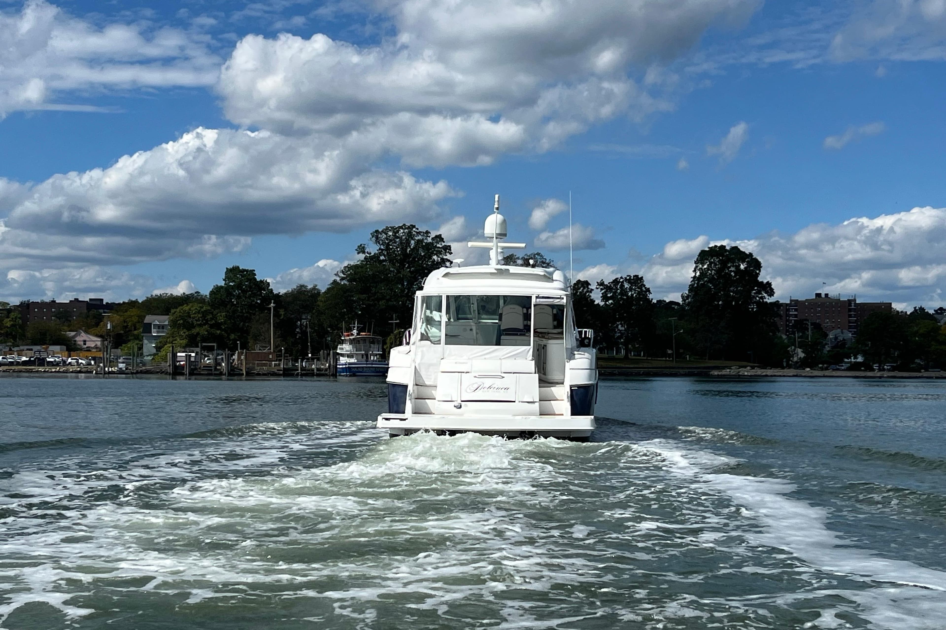 2010 Cruisers Yachts 520 Sports Coupe sailing on a sunny day.