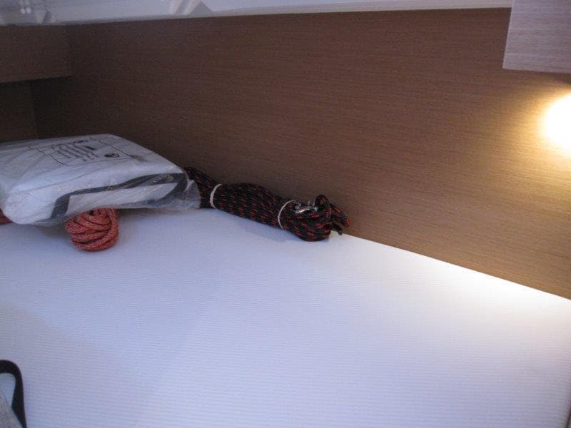 Interior of 2025 Jeanneau Sun Odyssey 350 yacht with ropes and light.