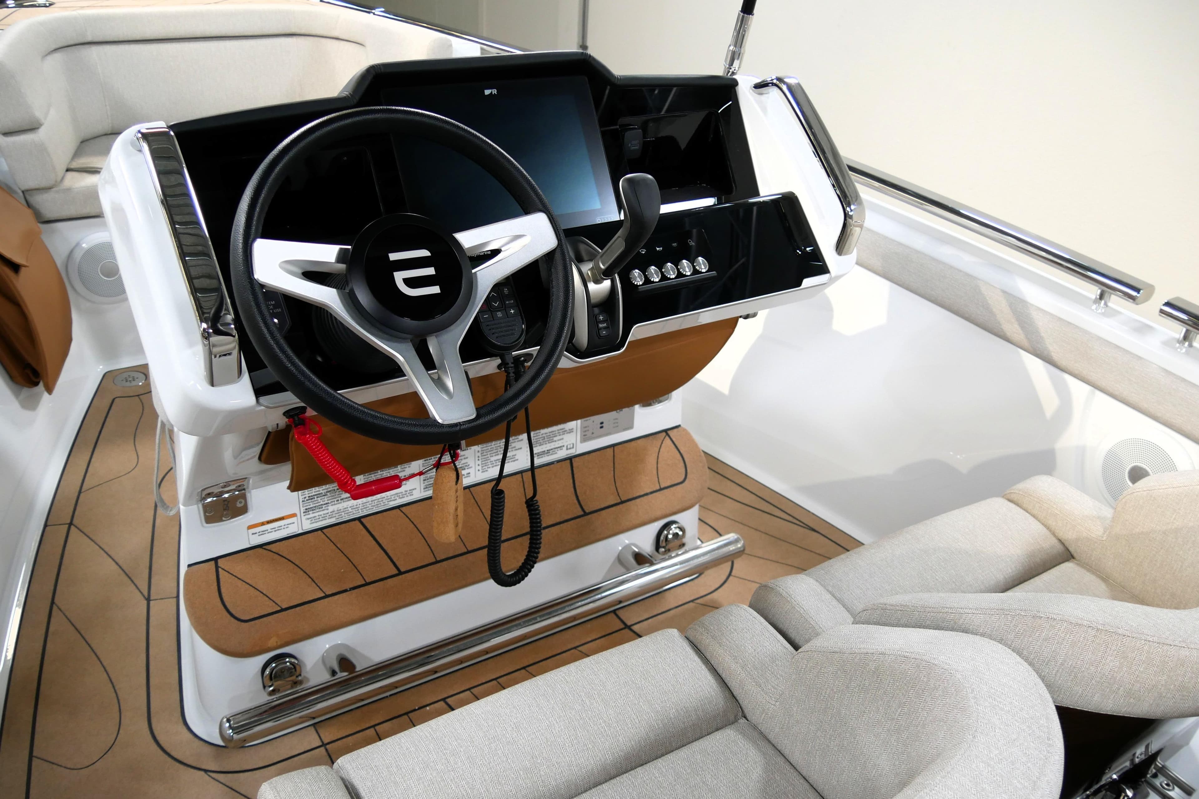 Steering console of 2026 Evene Origin 57 boat with modern design and controls.