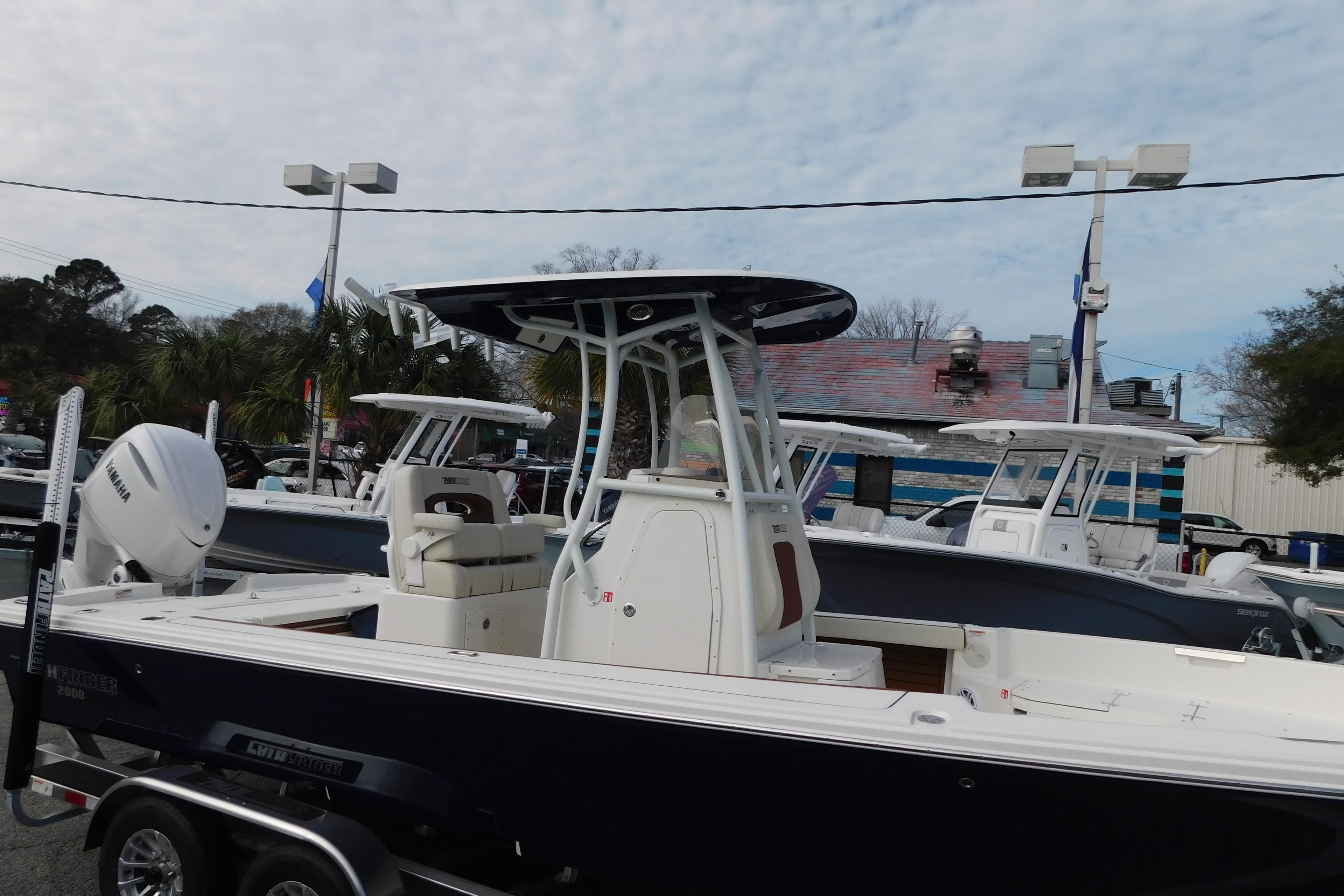 2026 Pathfinder 2600 TRS boat displayed outdoors with Yamaha engine.