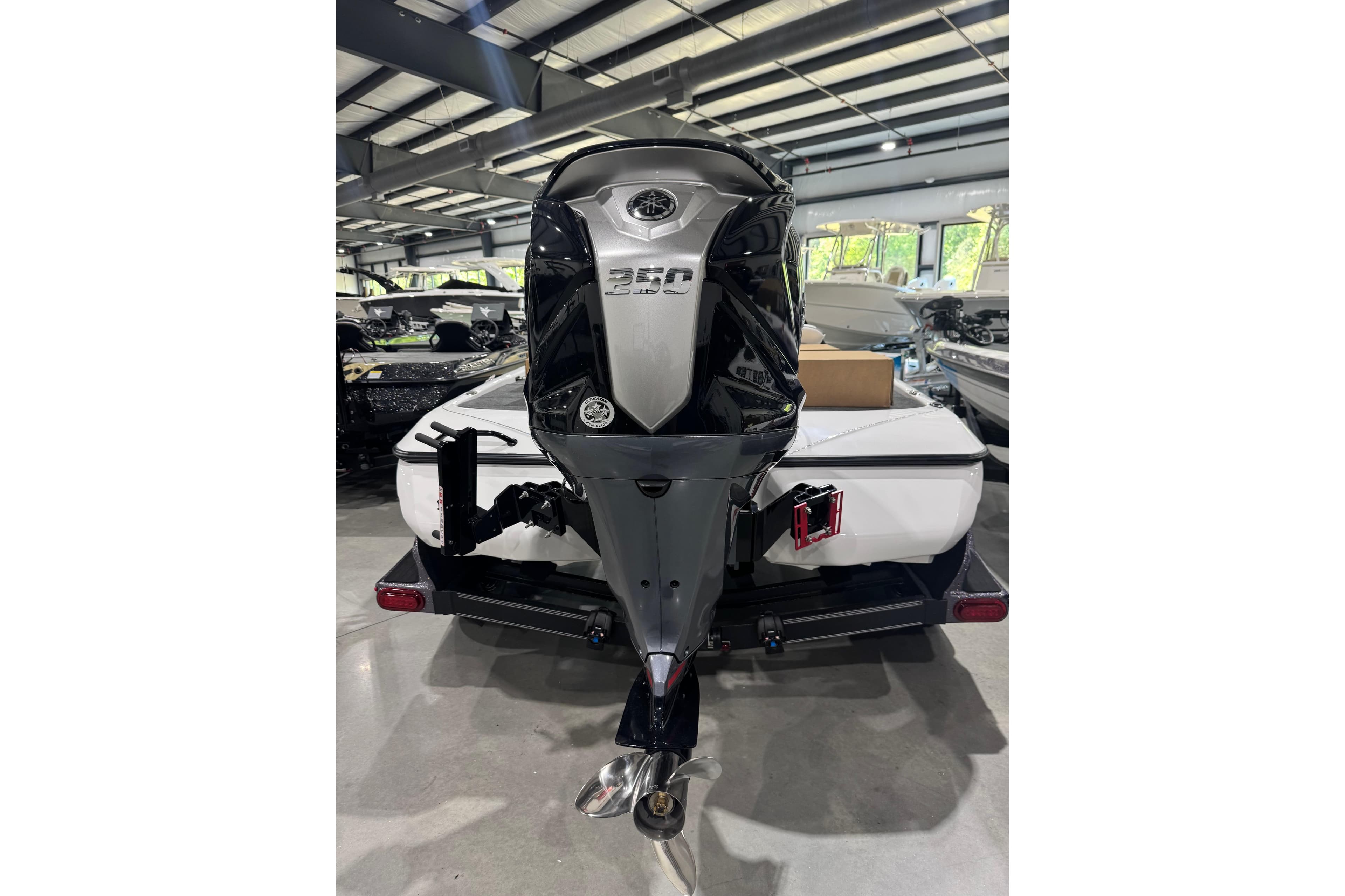 2026 Skeeter FXR21 FLEX boat with powerful 350 horsepower engine in showroom.