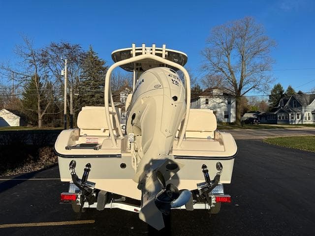 2025 Grady-White 231 Coastal Explorer boat, rear view, parked on trailer.
